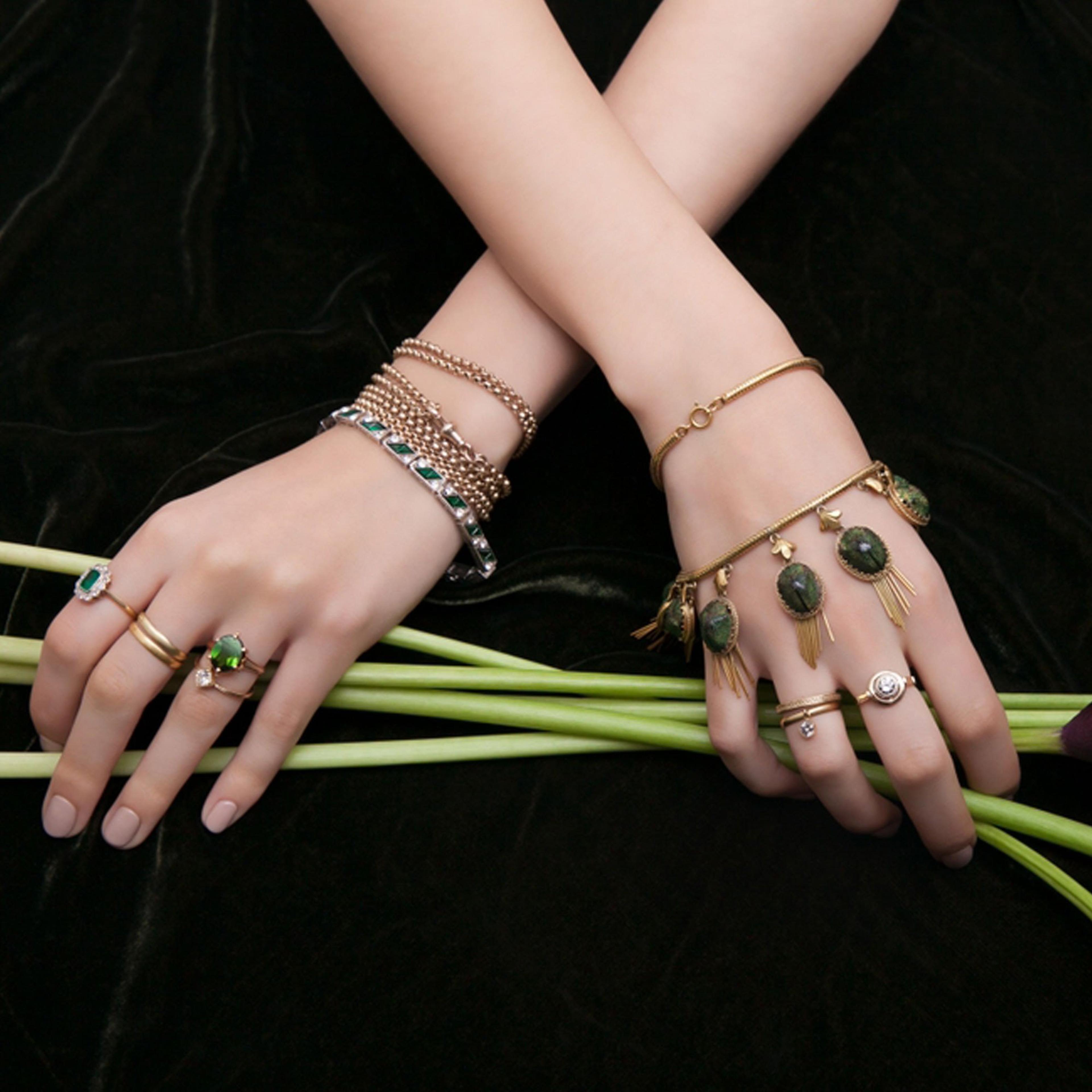 Closeup of the Victorian Pinchbeck Scarab Beetle Collar worn as a bracelet