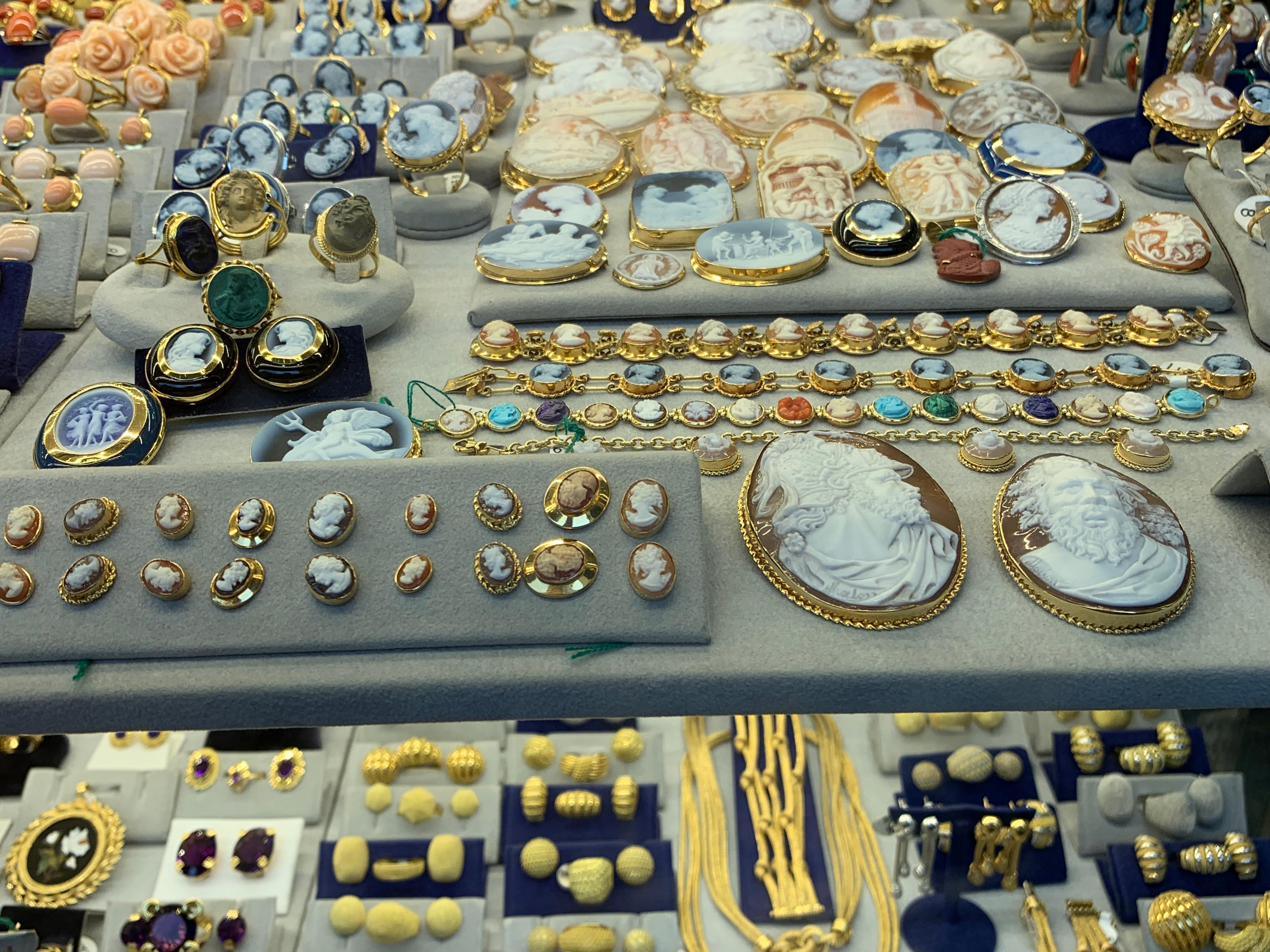 A jeweler's shop window on the Ponte Vecchio, including coral jewelry.