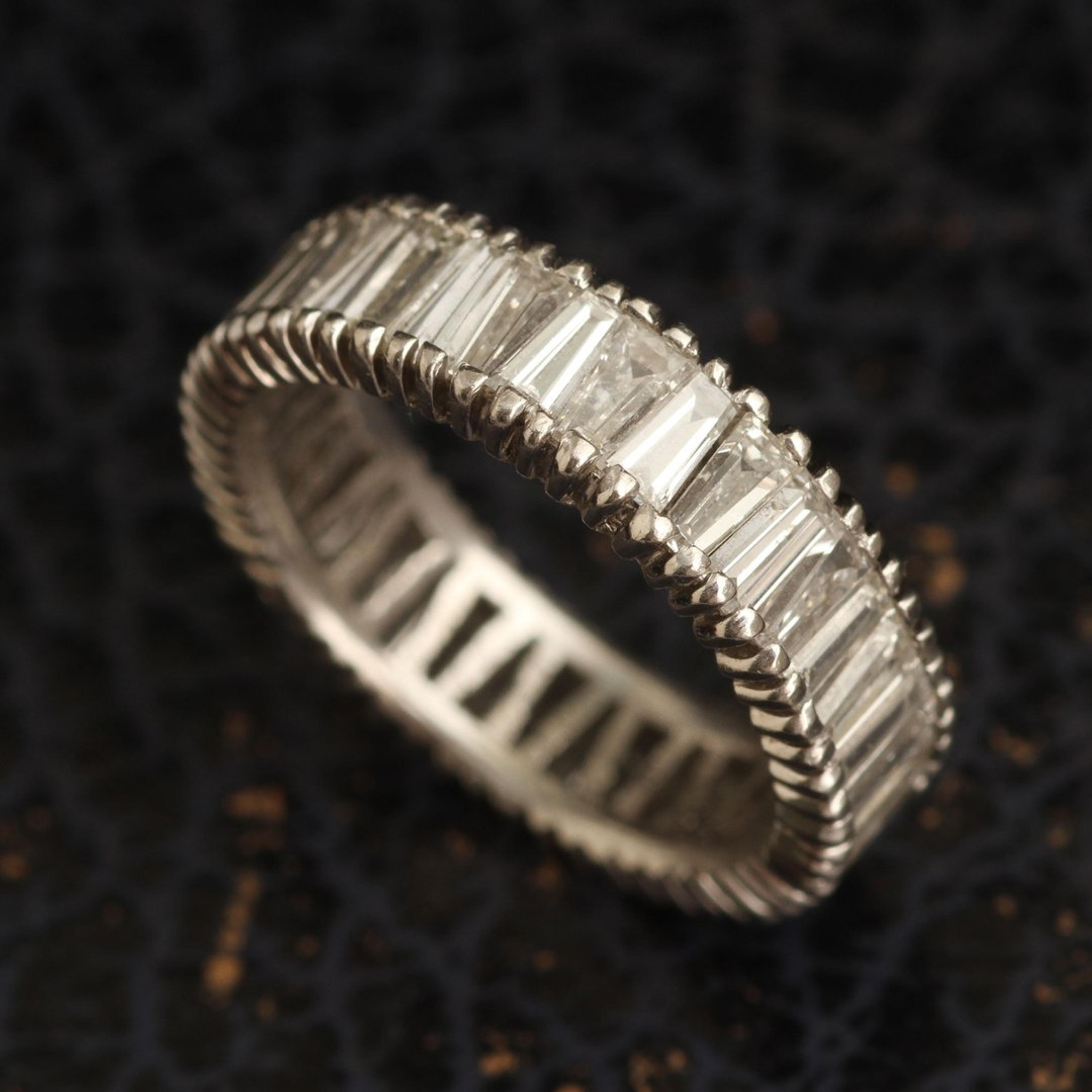 Detail of Vintage Platinum Tapered Baguette Eternity Ring