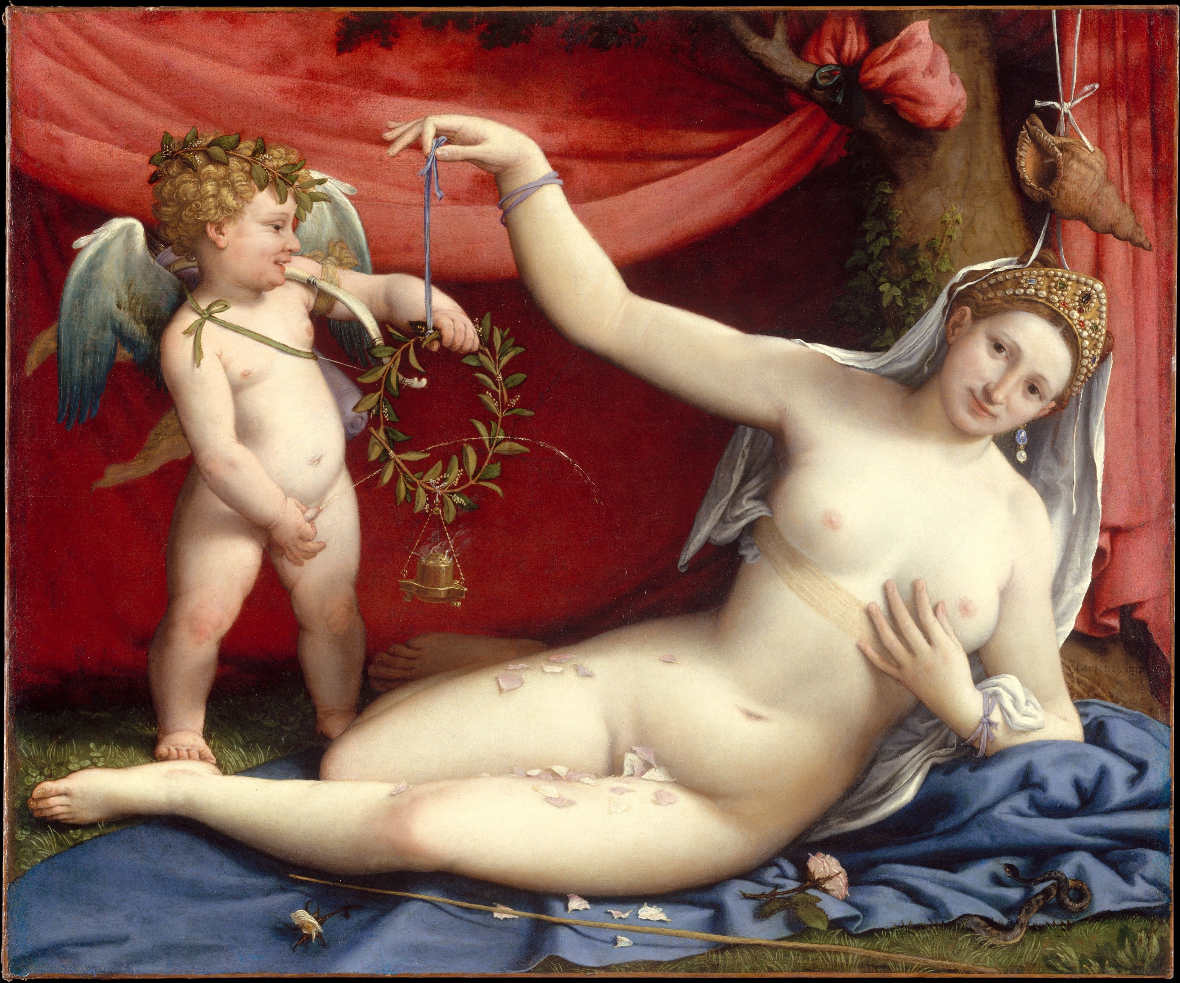 Cupid peeing on his mom, Venus (any boy moms relate?). This was a marriage painting and the knotted cloth around the breasts were known as a strophion. This is a Renaissance nod to clothing in Ancient Greece and Rome, when the groom untied it after the wedding.  Venus and Cupid by Lorenzo Lott, 1520s. The Metropolitan Museum of Art.