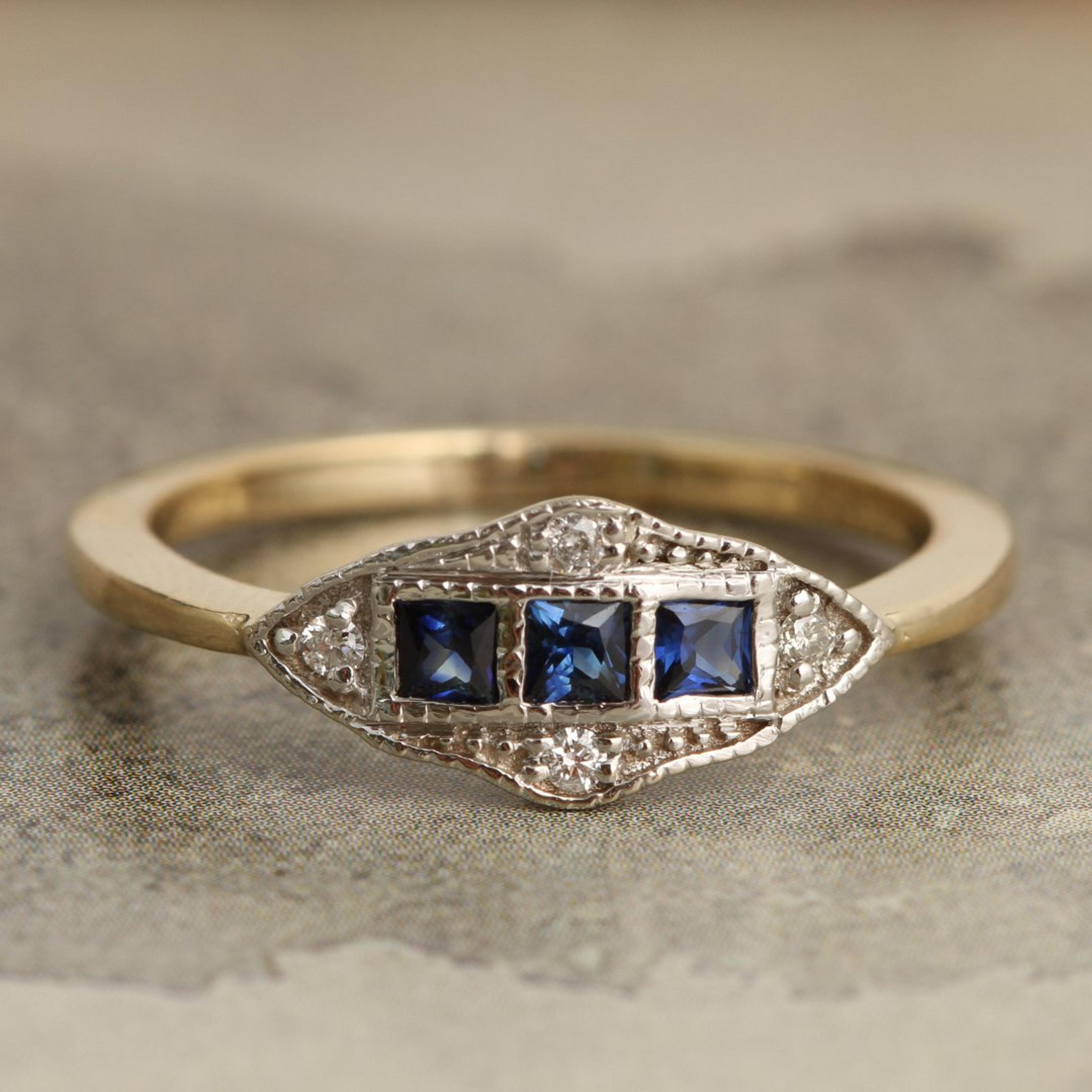 Closeup of Machine Age Ring with three sapphires