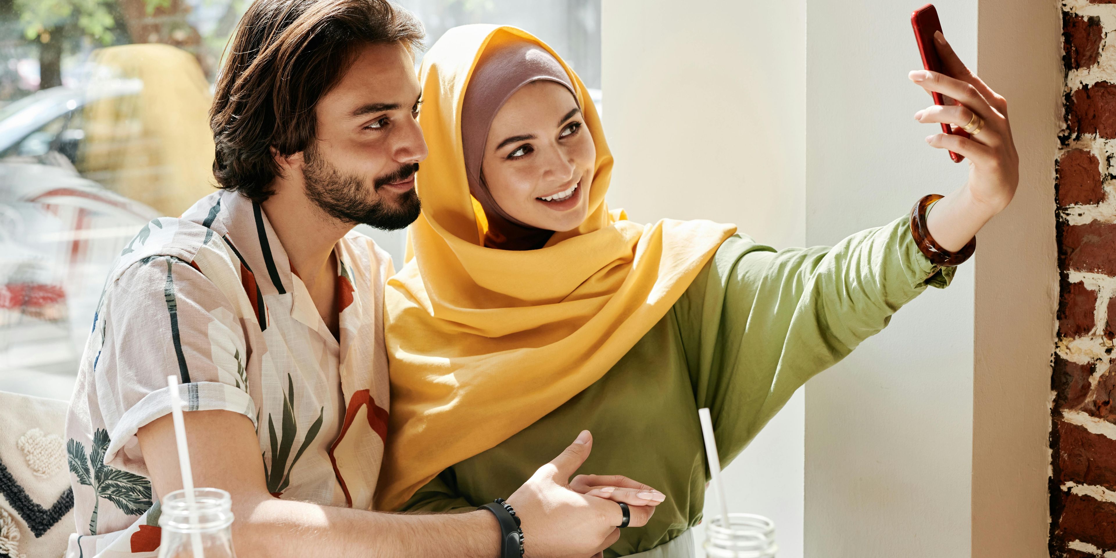 Muslim couple taking a selfie