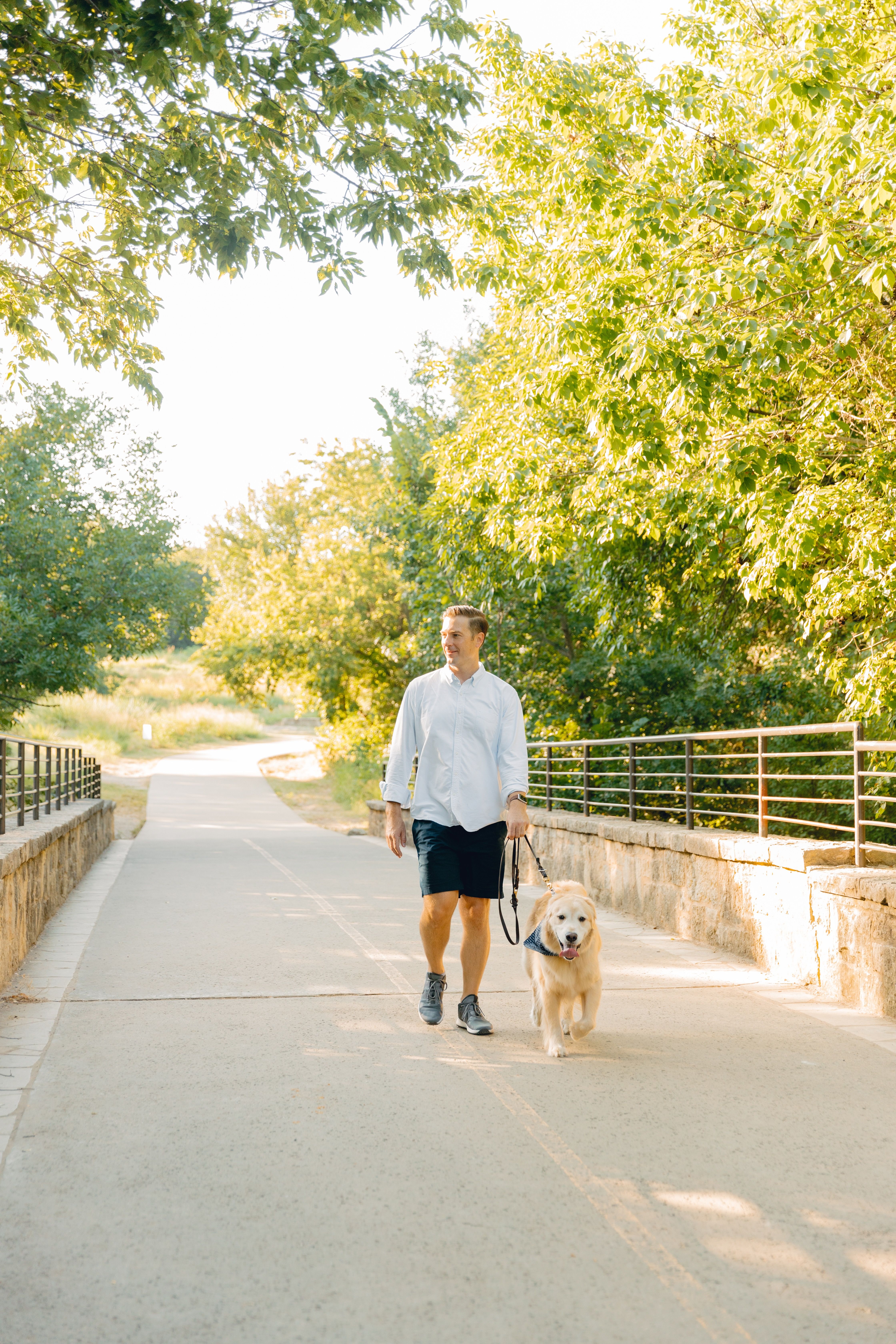 Matt and Corky walking on a trail in Plano