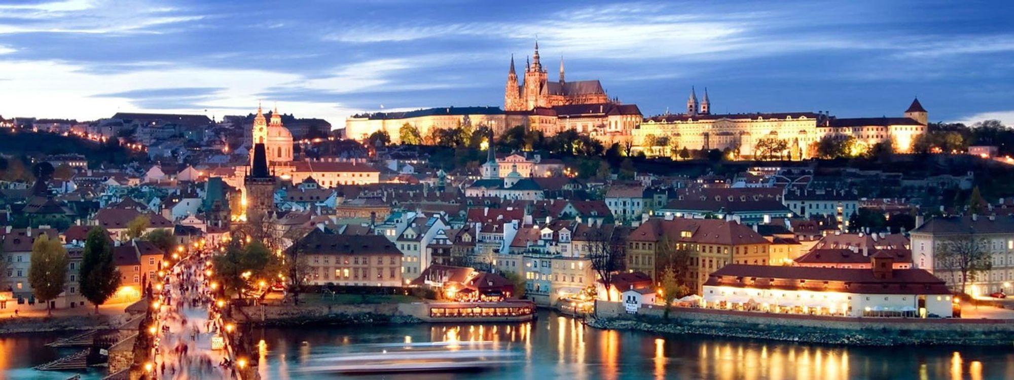 Prague Castle and Charles Bridge at dusk