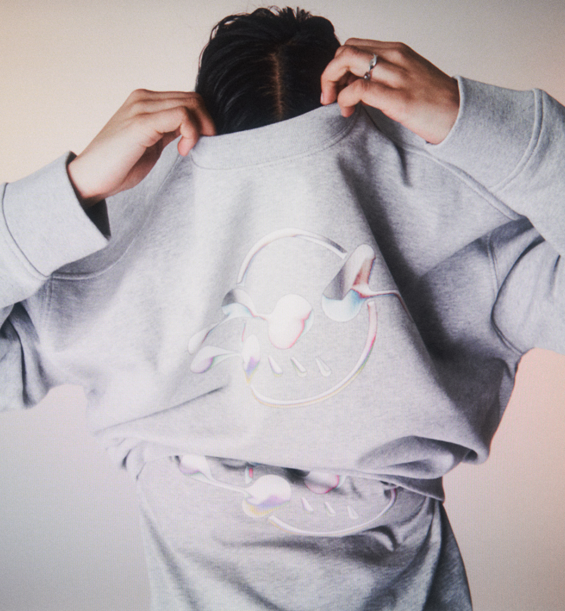 A hoodie with Creator Studio print