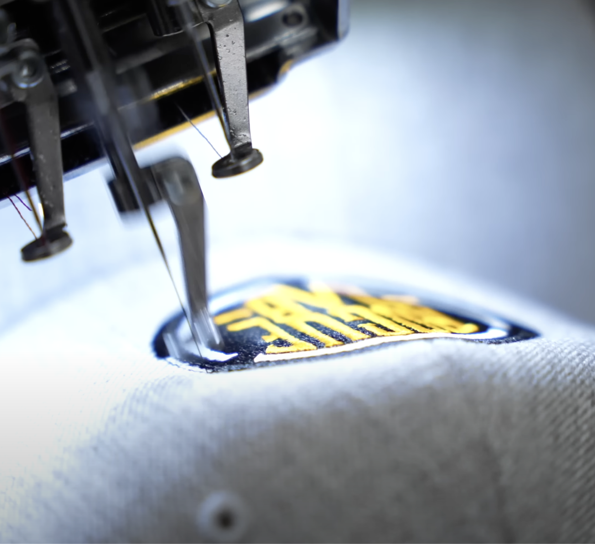 A close up of a Creator Studio embroidery machine