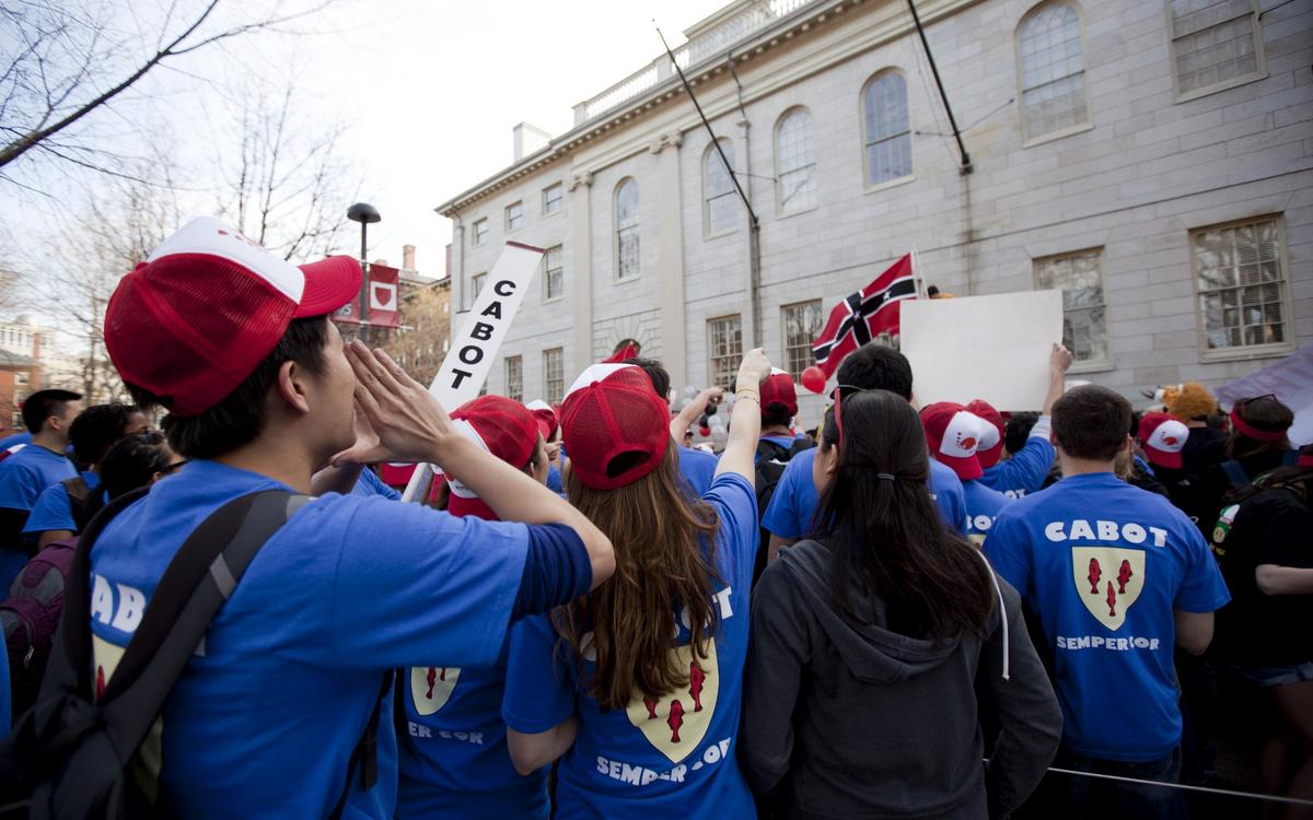 Cabot House residents gather outside University Hall on Housing Day. (Source)