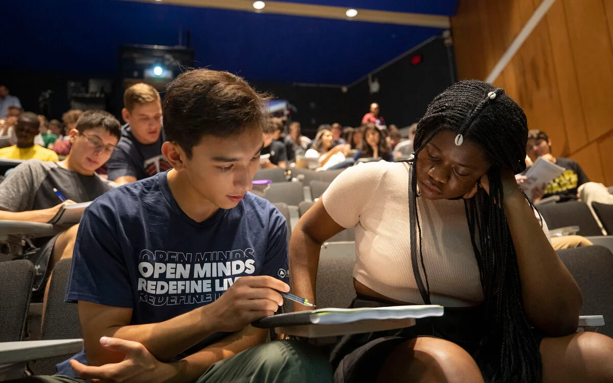 MBTI shirt reads "Open Minds Redefine Lives"