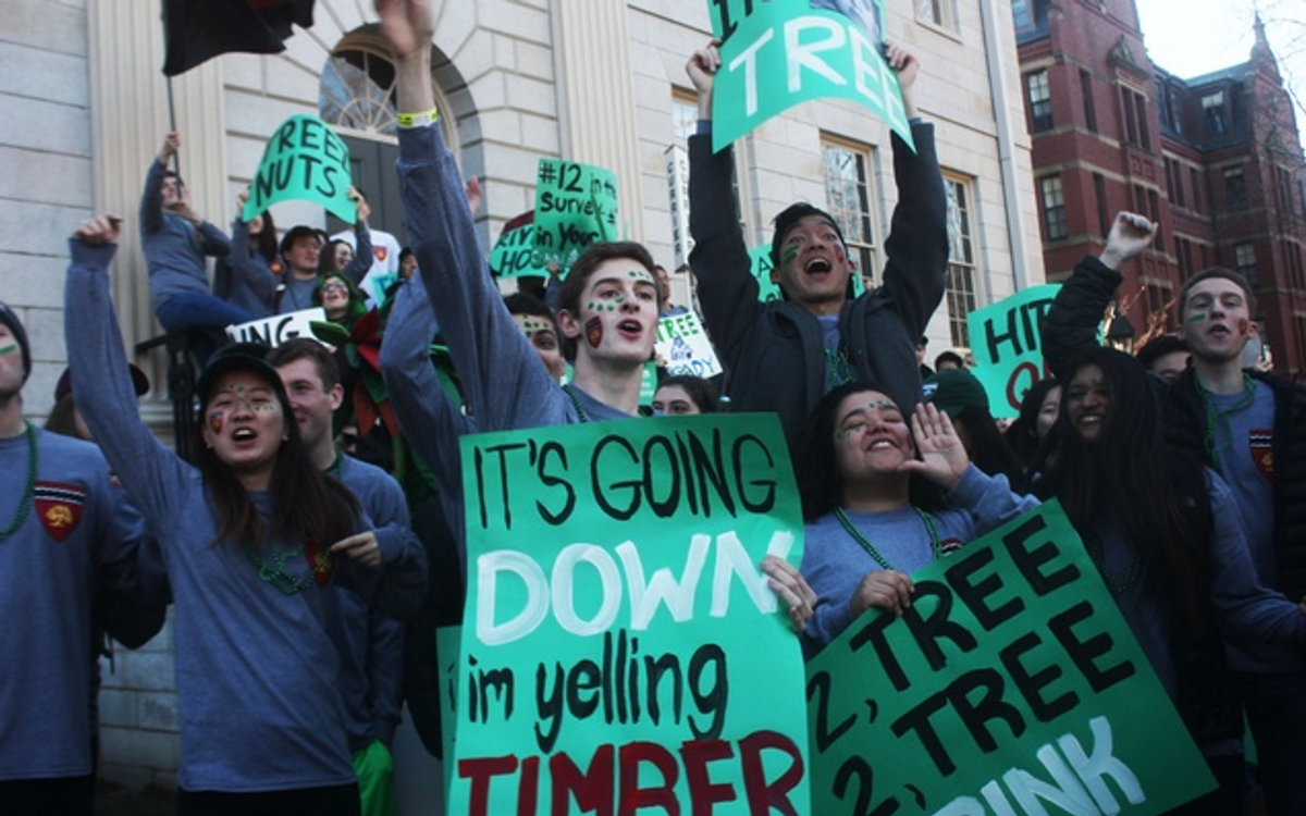 Spirited members of Currier House gather in front of University Hall on Housing Day. (Photo and caption credit: Lauren A. Sierra for the Harvard Crimson)