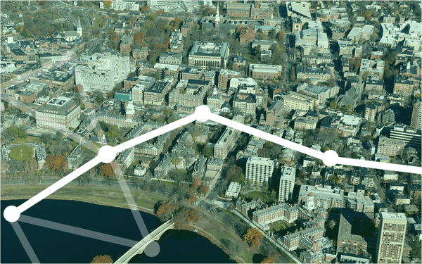 A green-tinted aeriel view of the upperclassman Houses at Harvard.