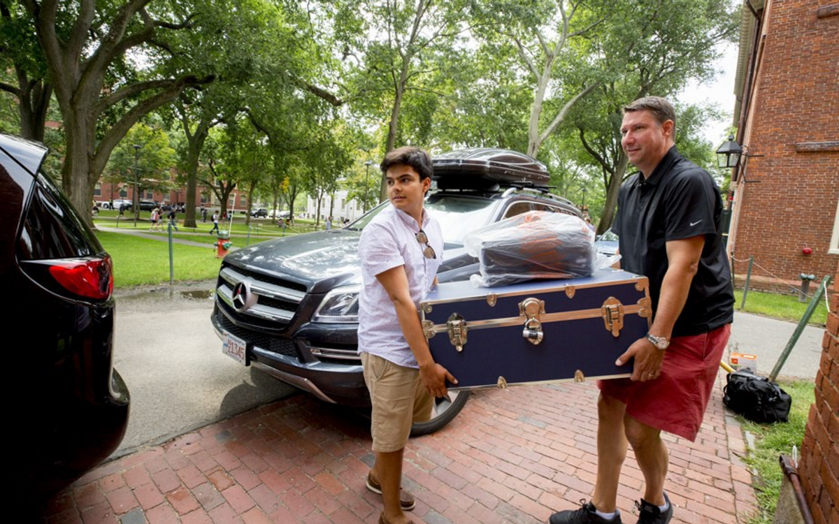 A member of the class of 2021 begins his freshman year (The Harvard Gazette)