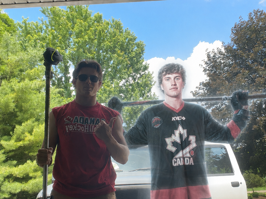 connor laskowski stands with rowan reynard on canada day 2026 for a cut above yard services in guelph