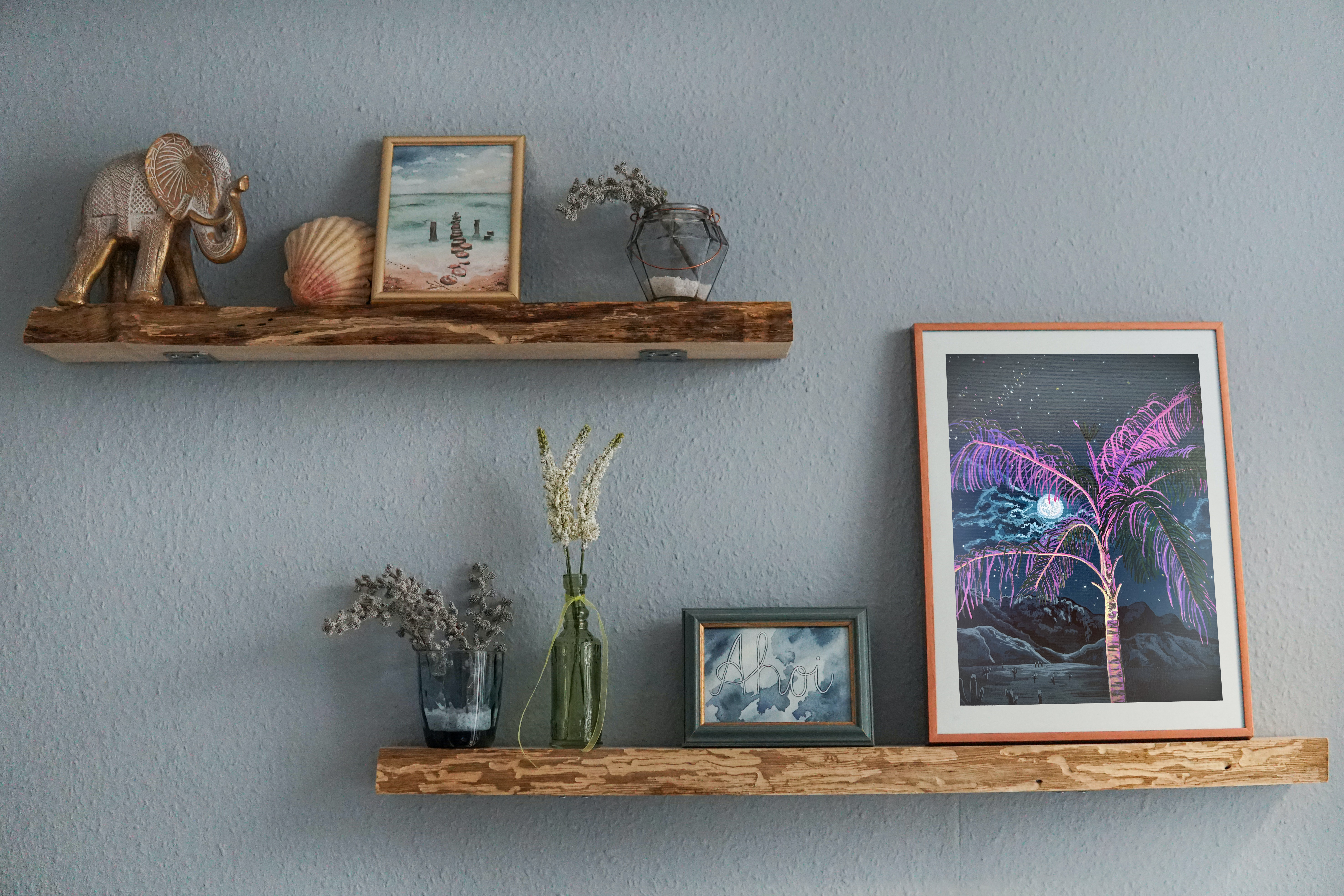 Original painting of a pink palm tree against a starry night sky. The bright moon illuminates the clouds.