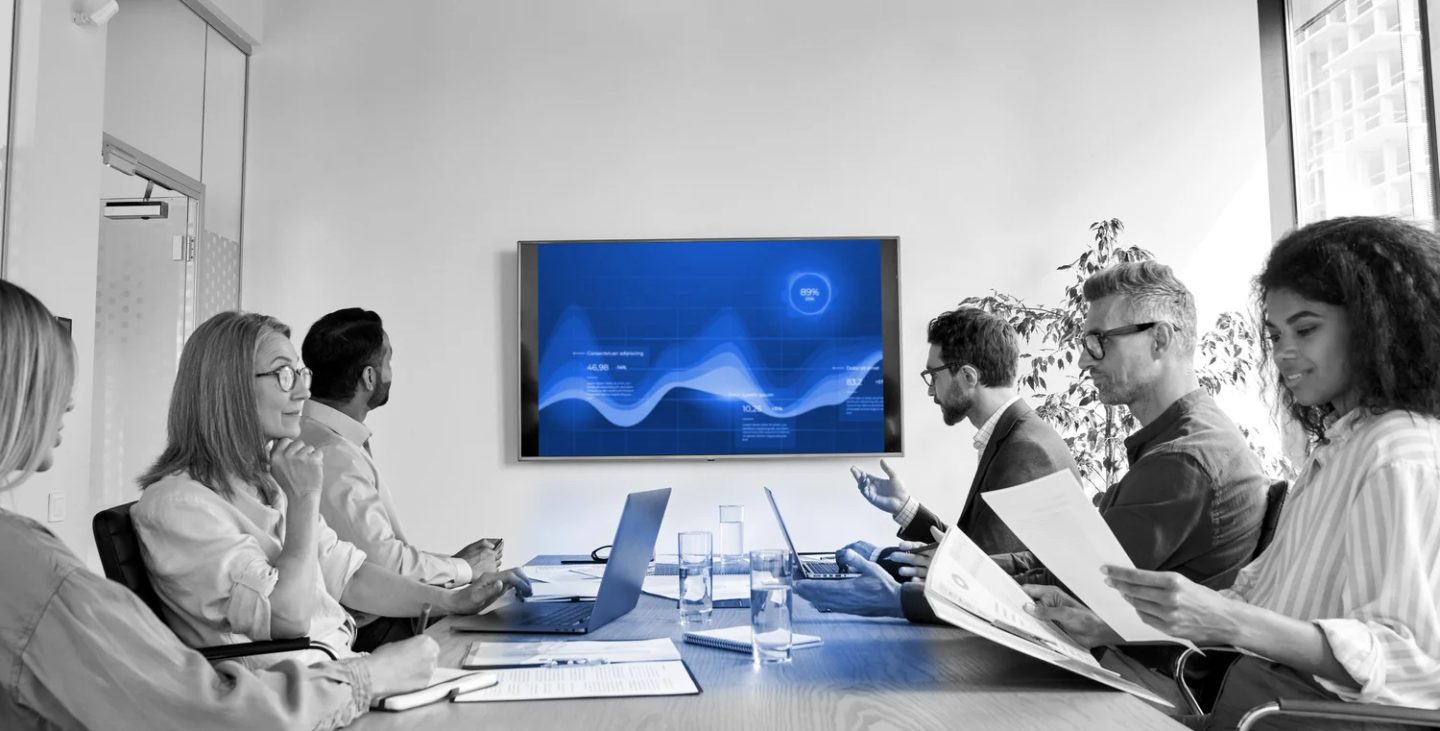 Blue light trails on black, the artwork behind Creative Blue investor pitch work.