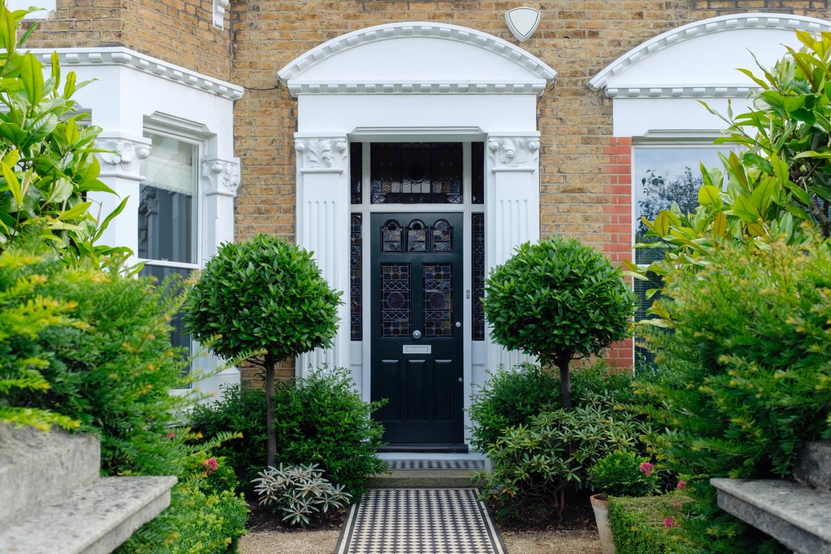 The elegant entrance of a refurbished period home, cared for long after completion.