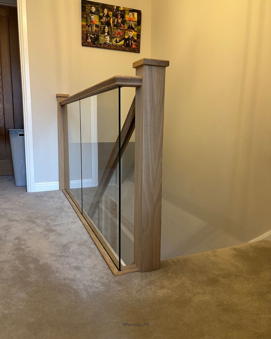 The new oak and glass balustrade opening up the stairwell.