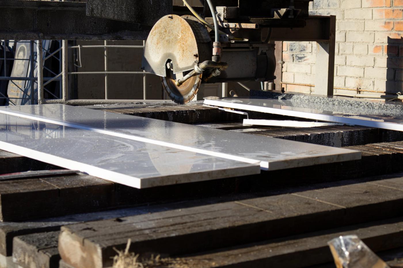 Slabs being cut to size on the saw bench.