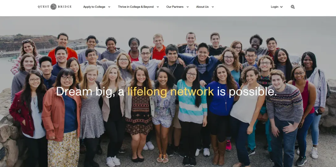 QuestBridge homepage showing a large group of smiling students under the headline "Dream big, a lifelong network is possible."