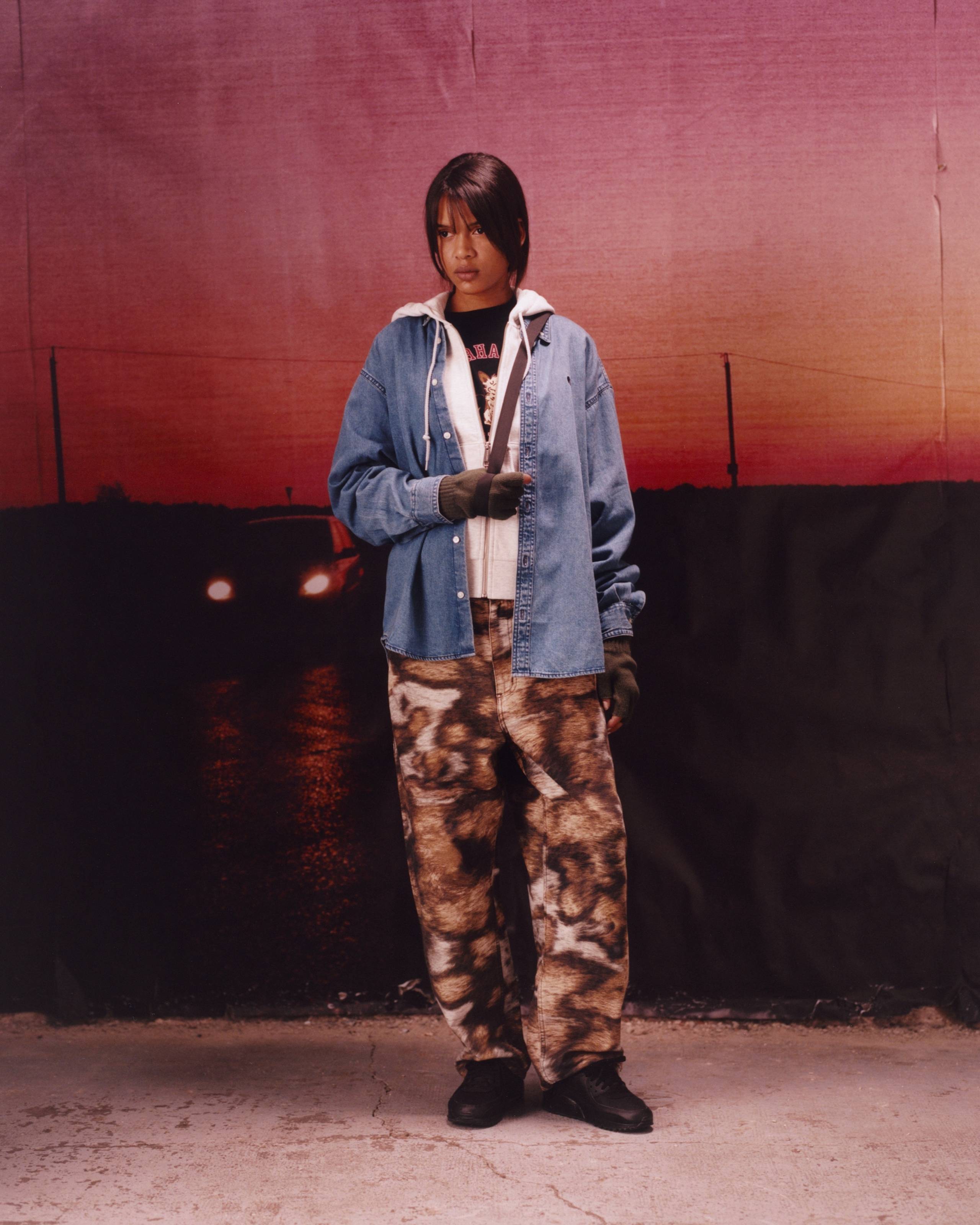 Model wearing items from the Carhartt WIP F/W25 Women's Lookbook
