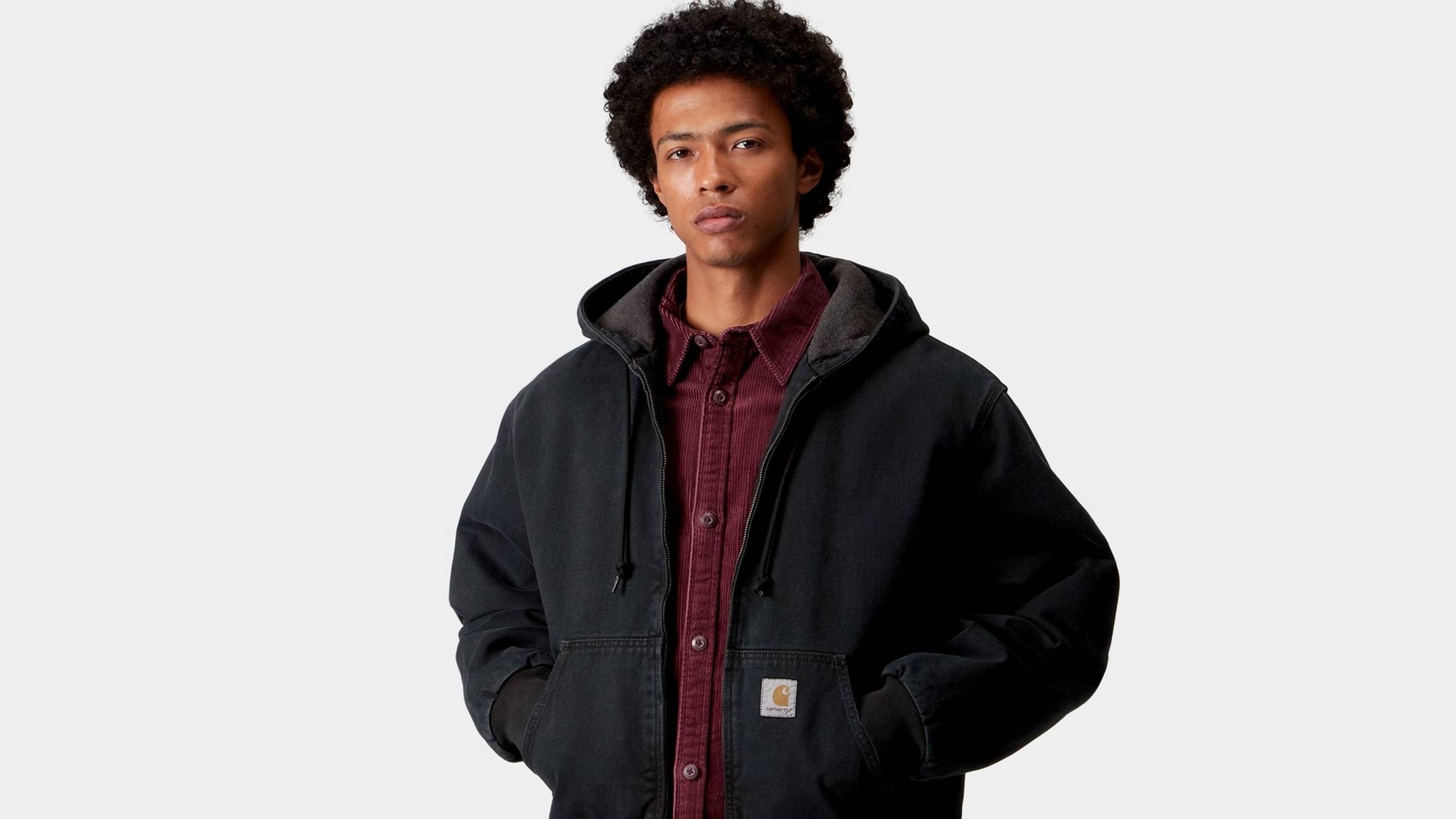 Model wearing an OG Active Jacket in Black