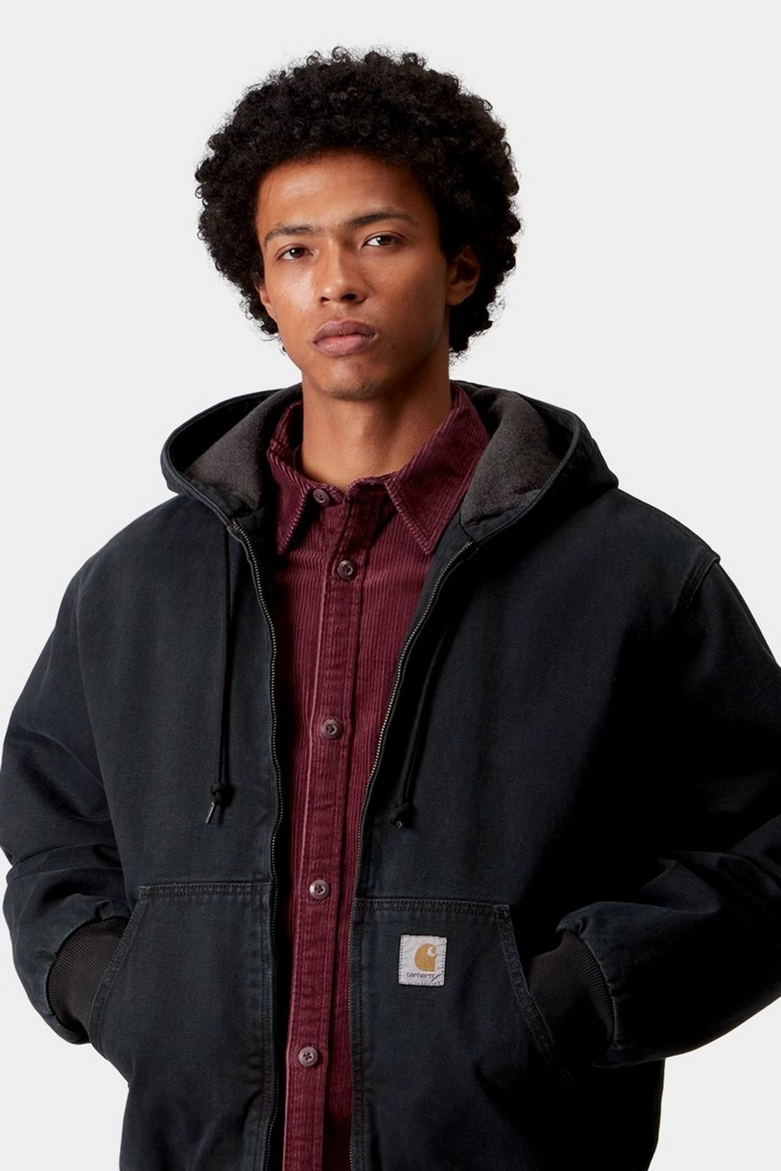Model wearing an OG Active Jacket in Black