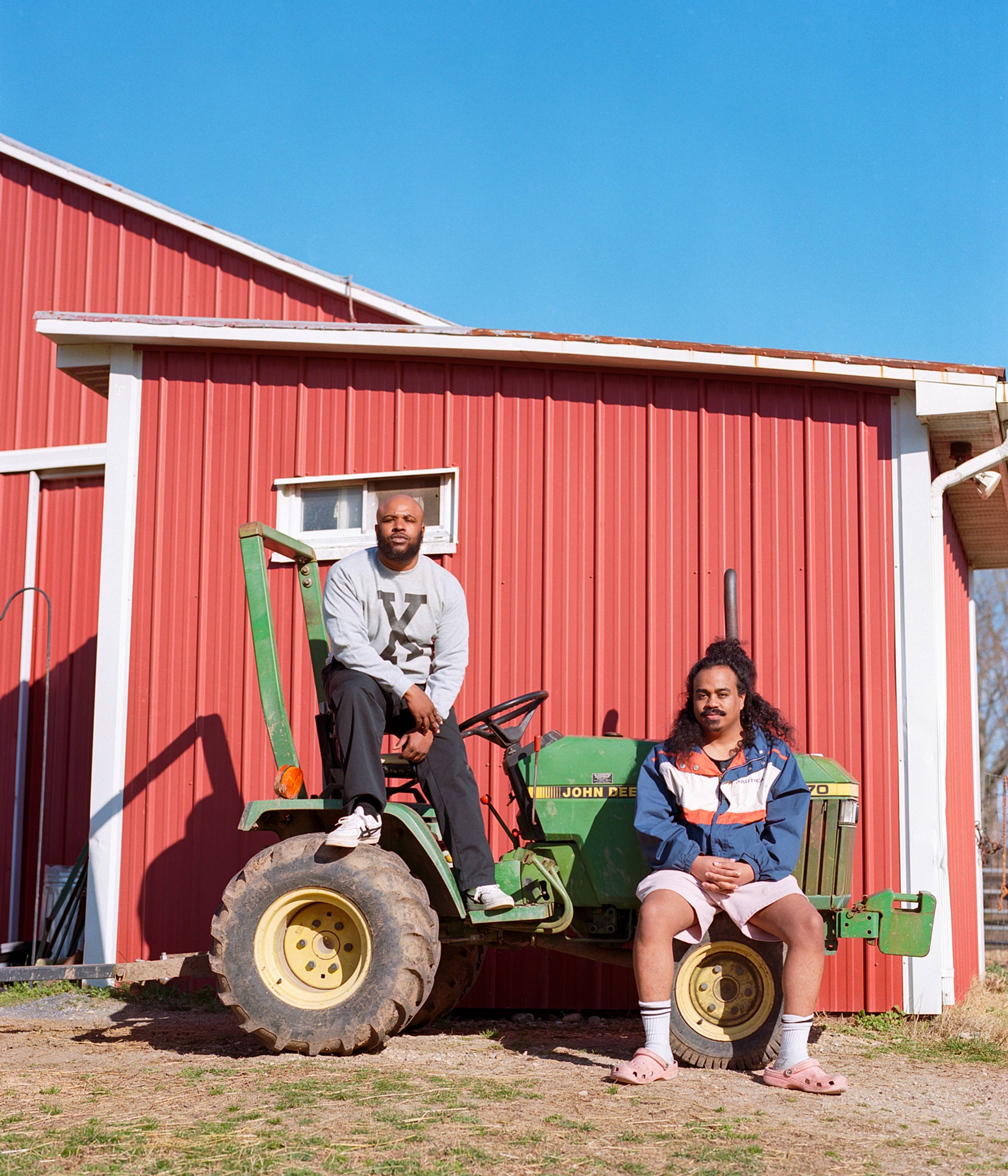 Infinity Knives posing near a barn