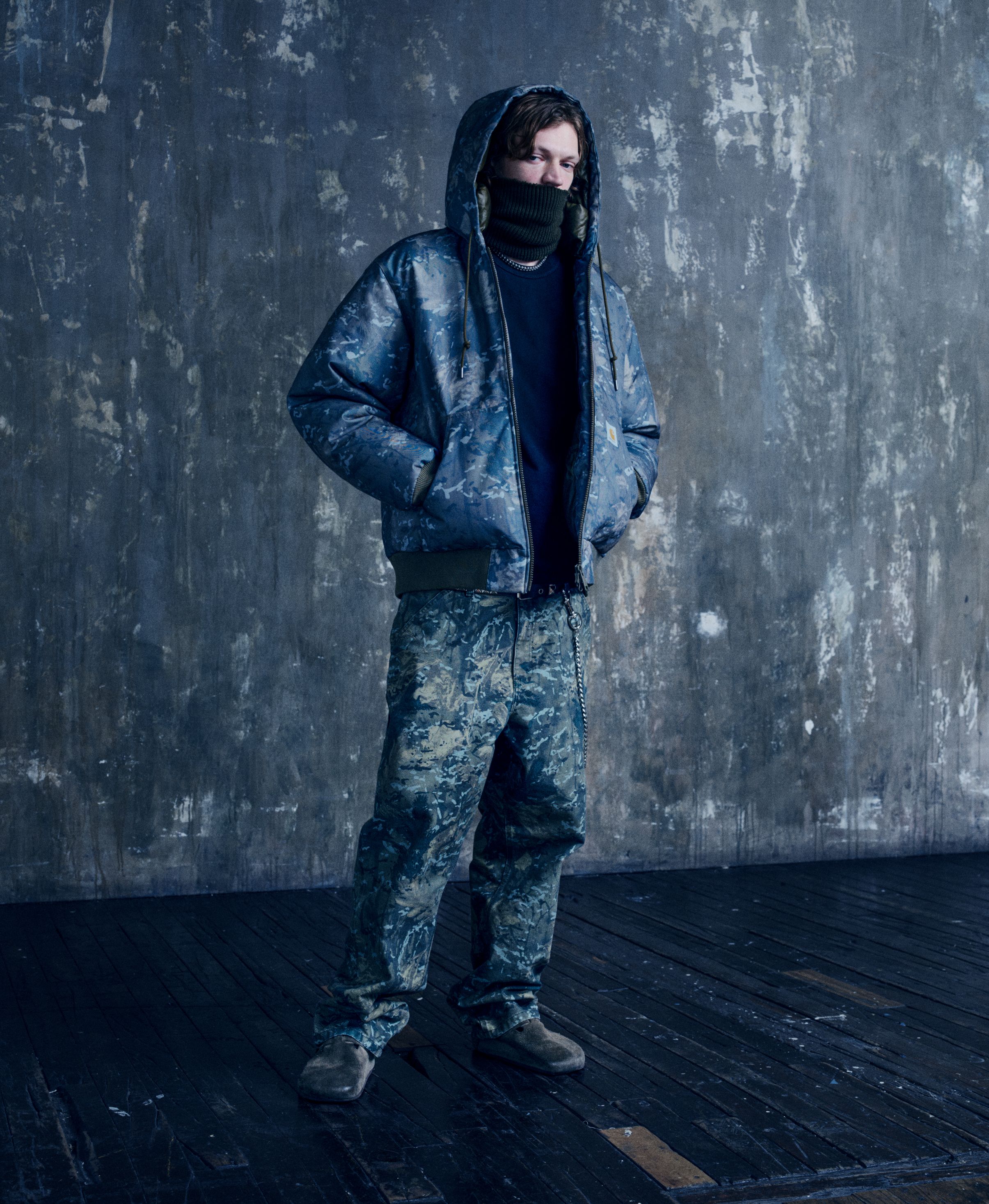 Model wearing a full Camo Combi look from the In Plain Sight Collection
