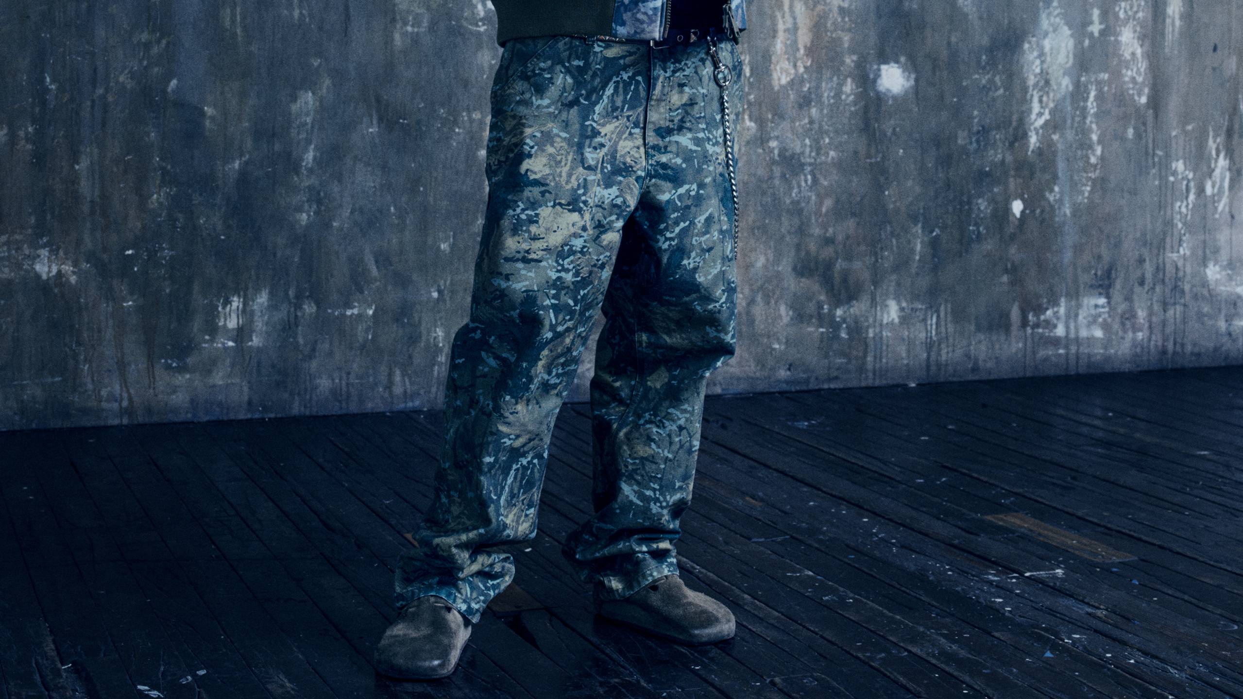 Model wearing a full Camo Combi look from the In Plain Sight Collection