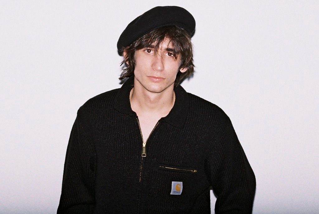 Model wearing a beret and a Detroit Sweater in F/W25 Store Exclusives shoot