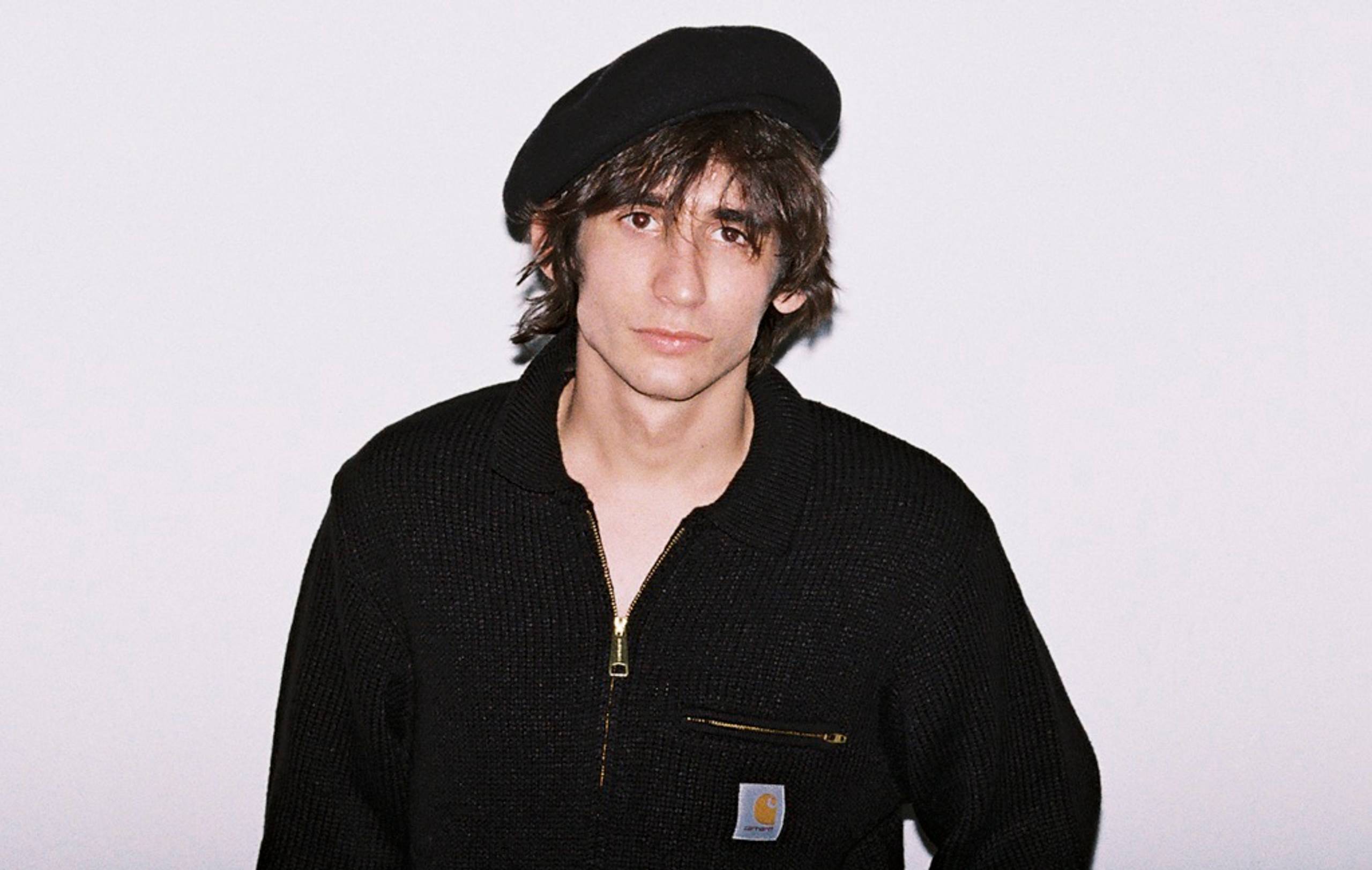 Model wearing a beret and a Detroit Sweater in F/W25 Store Exclusives shoot