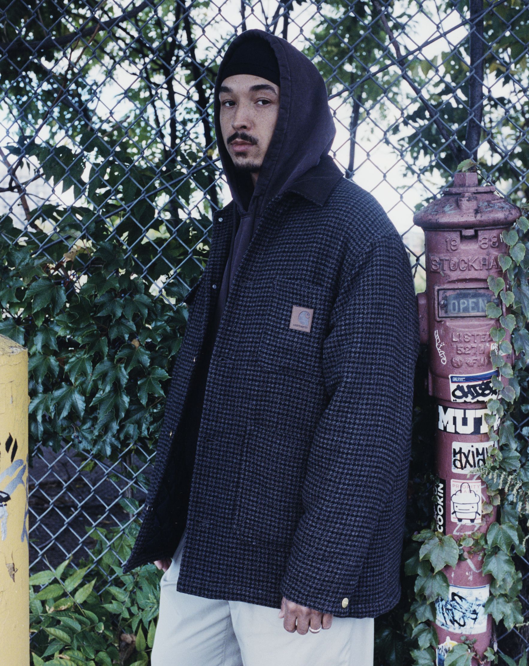 Model wearing a Lowis Houndstooth Chore Coat