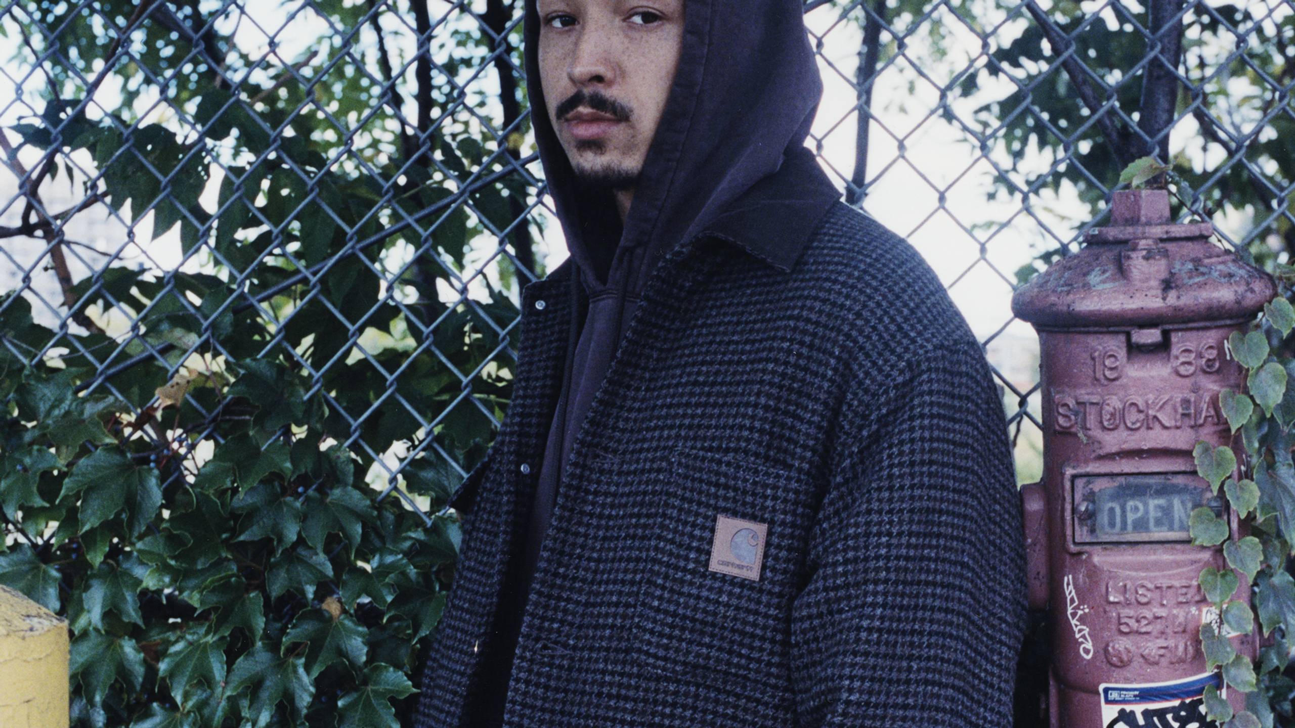 Model wearing a Lowis Houndstooth Chore Coat