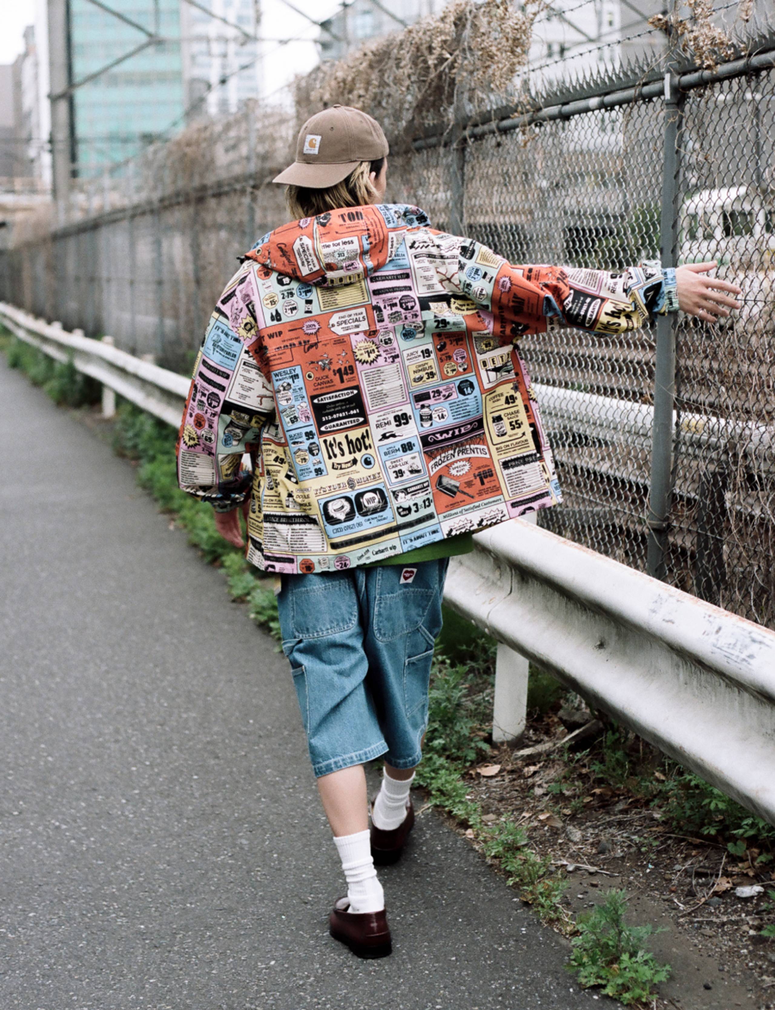 Model wearing a Swizzle Windbreaker in Hue Catalogue Print