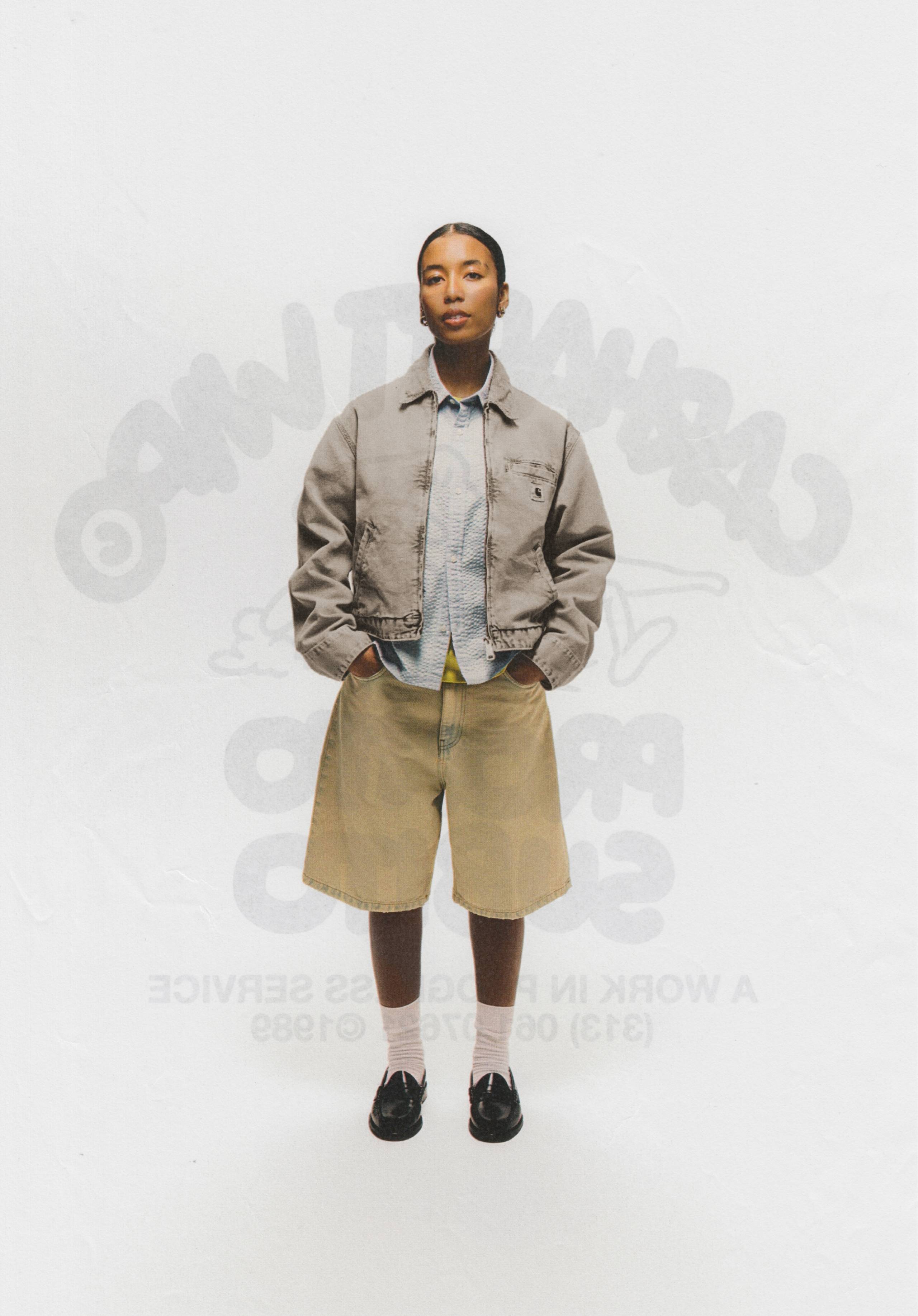 Model wearing a Carhartt WIP Women's Emery Jacket in Black Chalk Wash from the S/S25 Collection