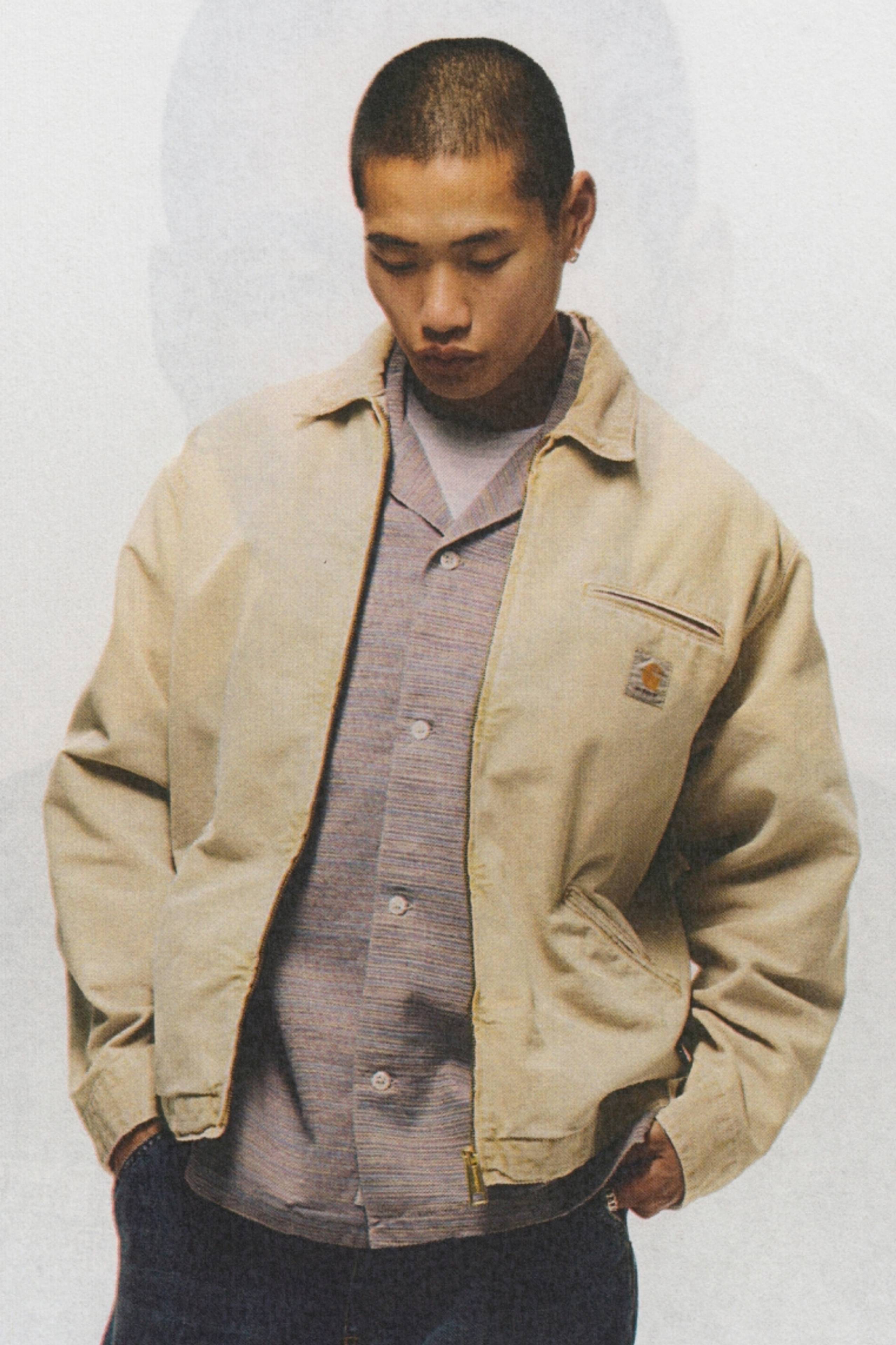 Model wearing Carhartt WIP OG Detroit Jacket in Chalk Wash