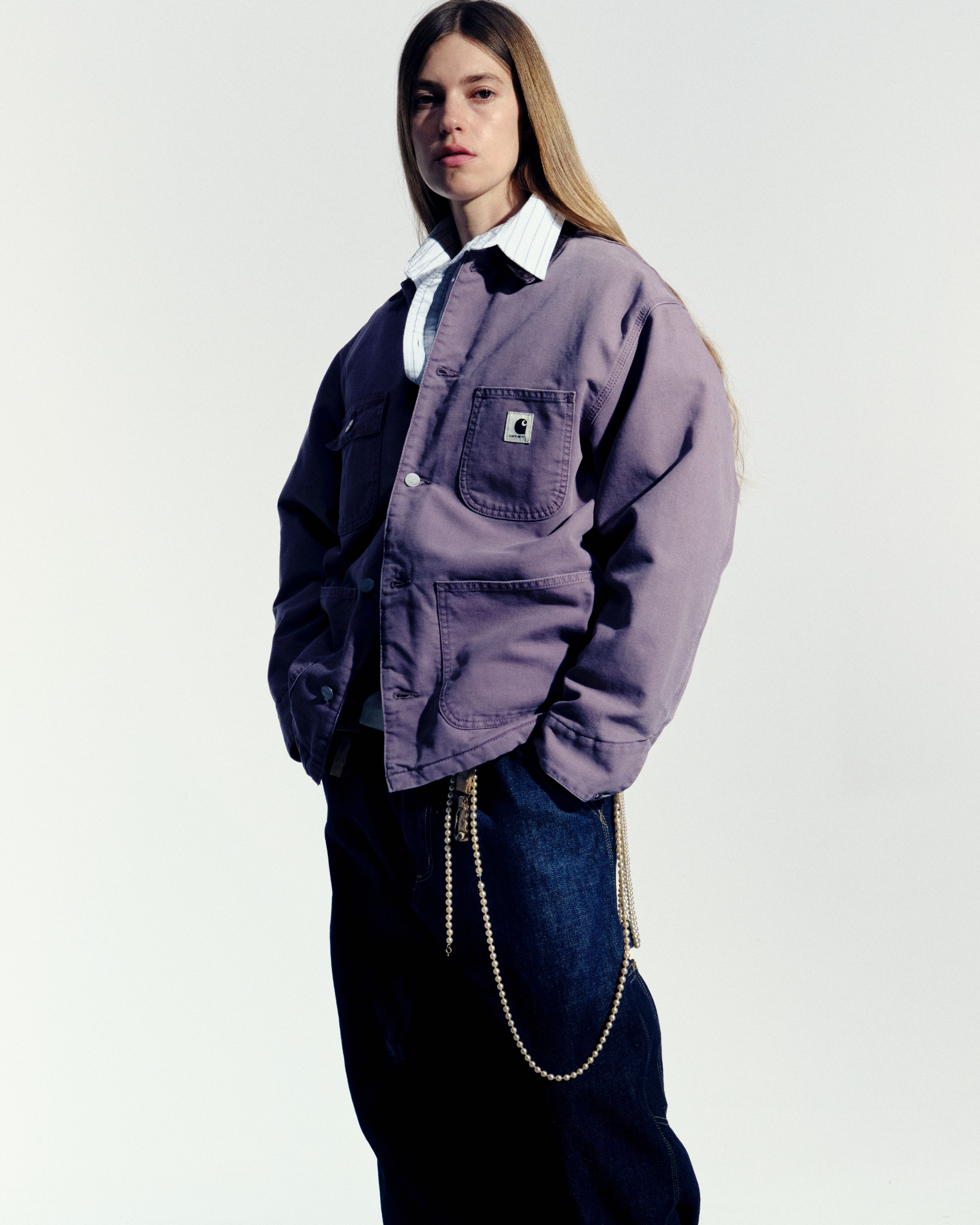 Model wearing a Chore Coat and Blue Jeans in F/W25: Icons Shoot