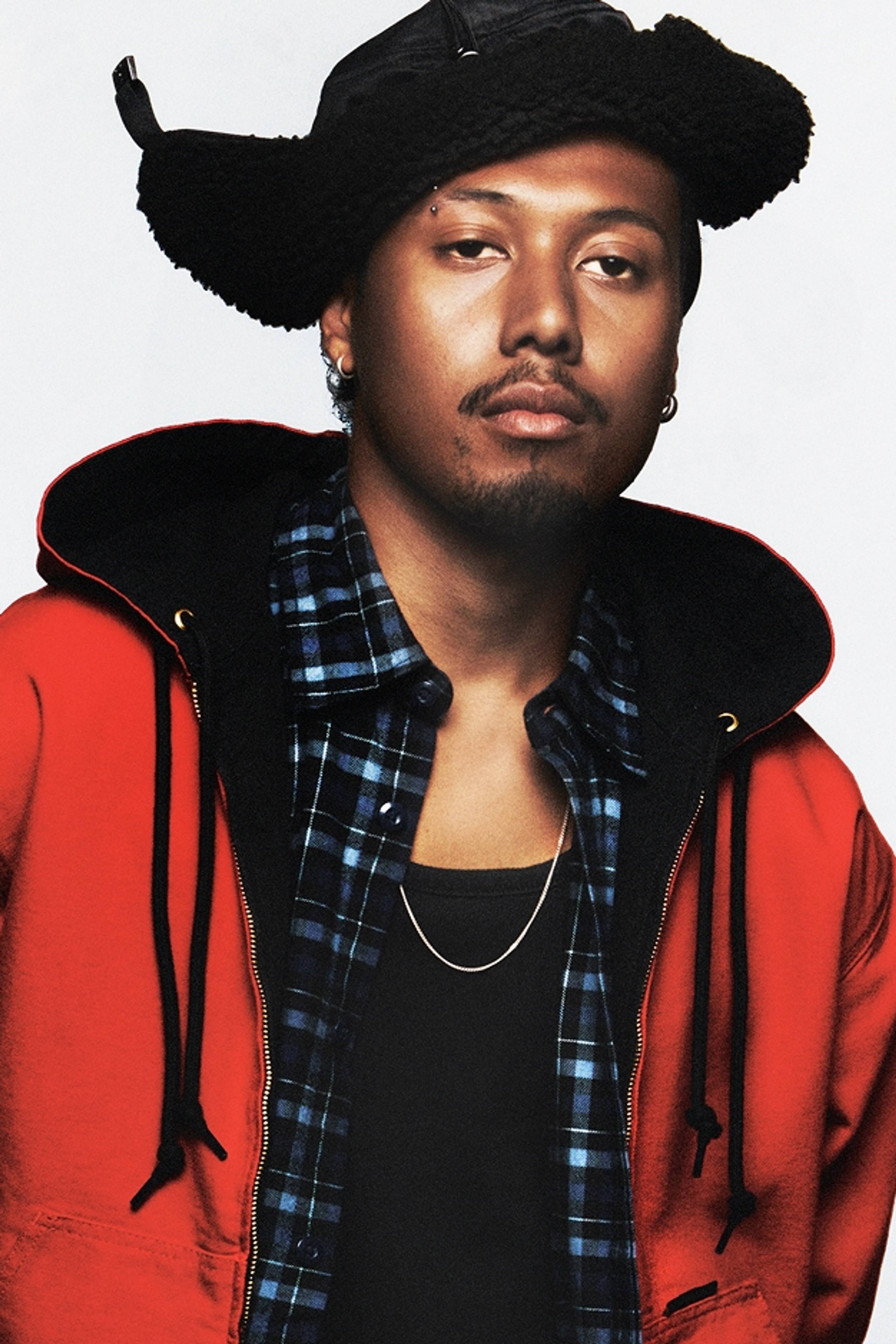 Model wearing a Red OG Active Jacket from the OG Active Jacket 50th Anniversary Edition