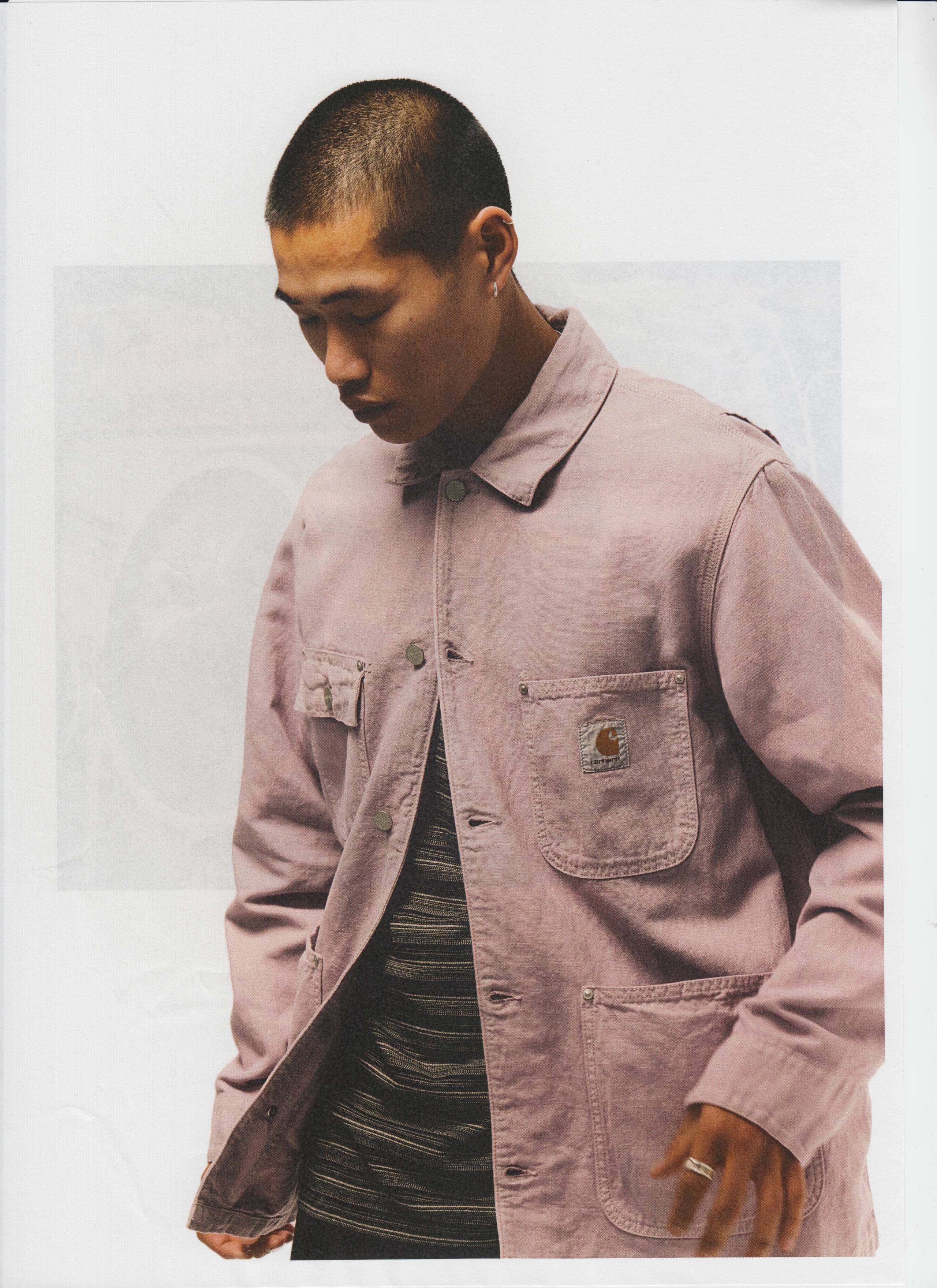 Model wearing light pink Carhartt WIP chore coat