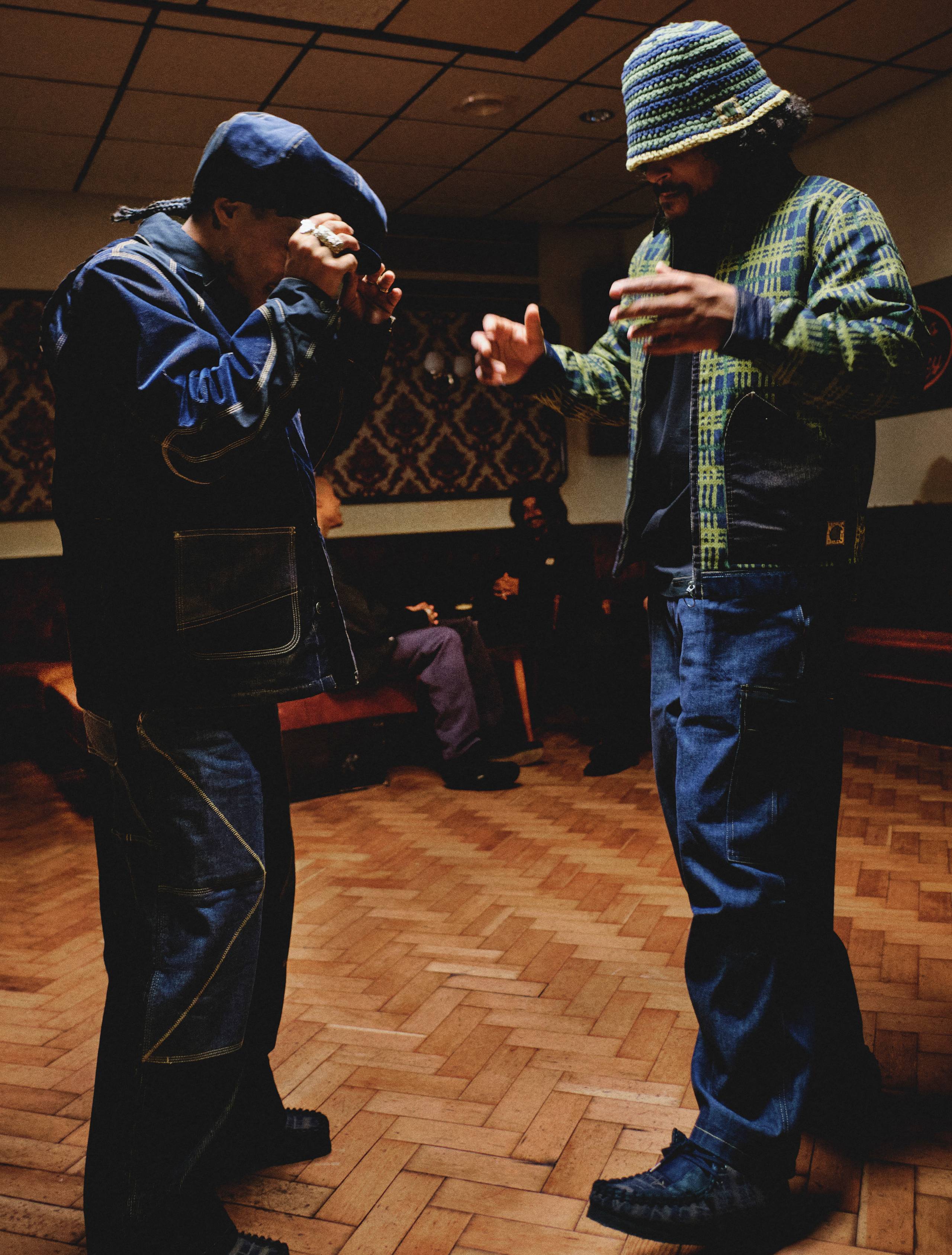 Models dancing while wearing items from the Nicholas Daley x Carhartt WIP Collaboration