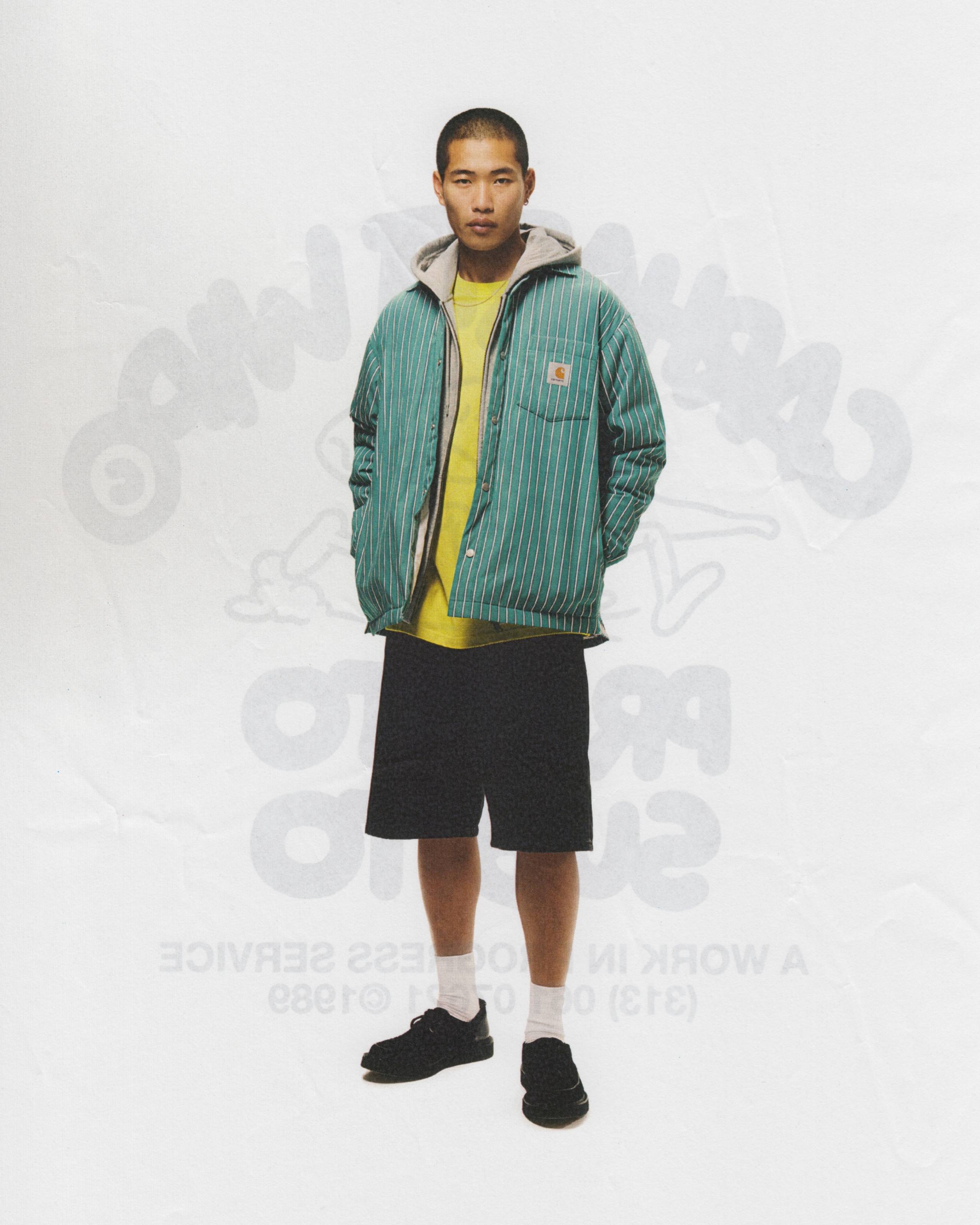 Model wearing Carhartt WIP Grimsby shirt jacket in green
