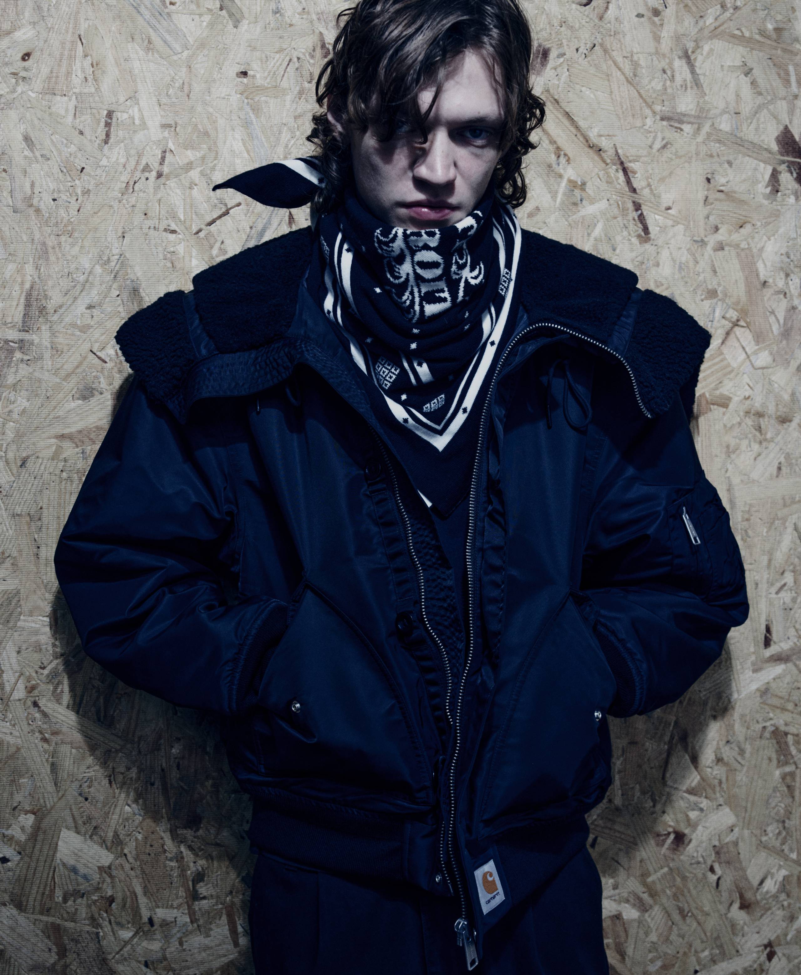 Model wearing a Hooded Oltera Bomber in Black