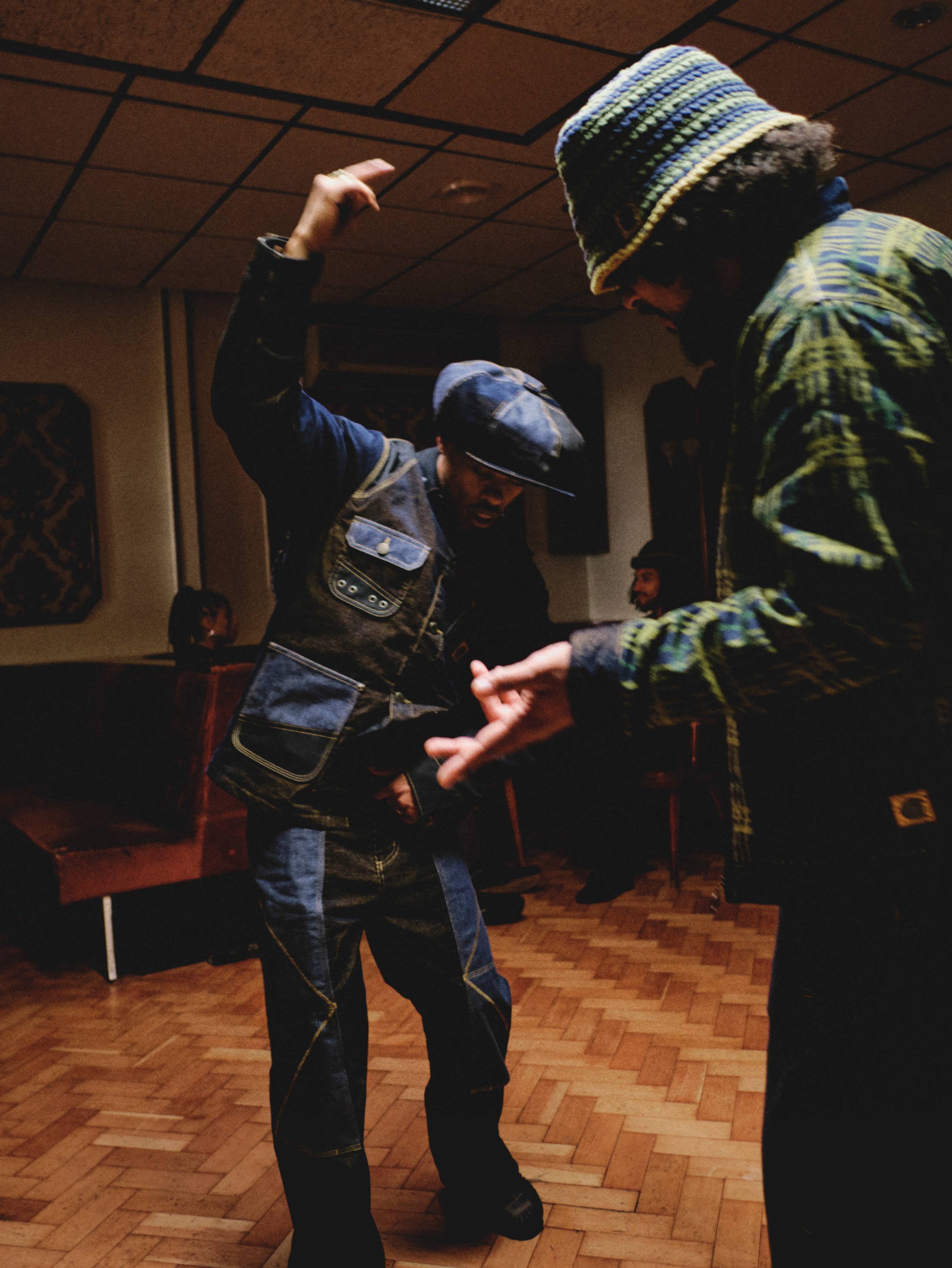Models dancing while wearing items from the Nicholas Daley x Carhartt WIP Collaboration