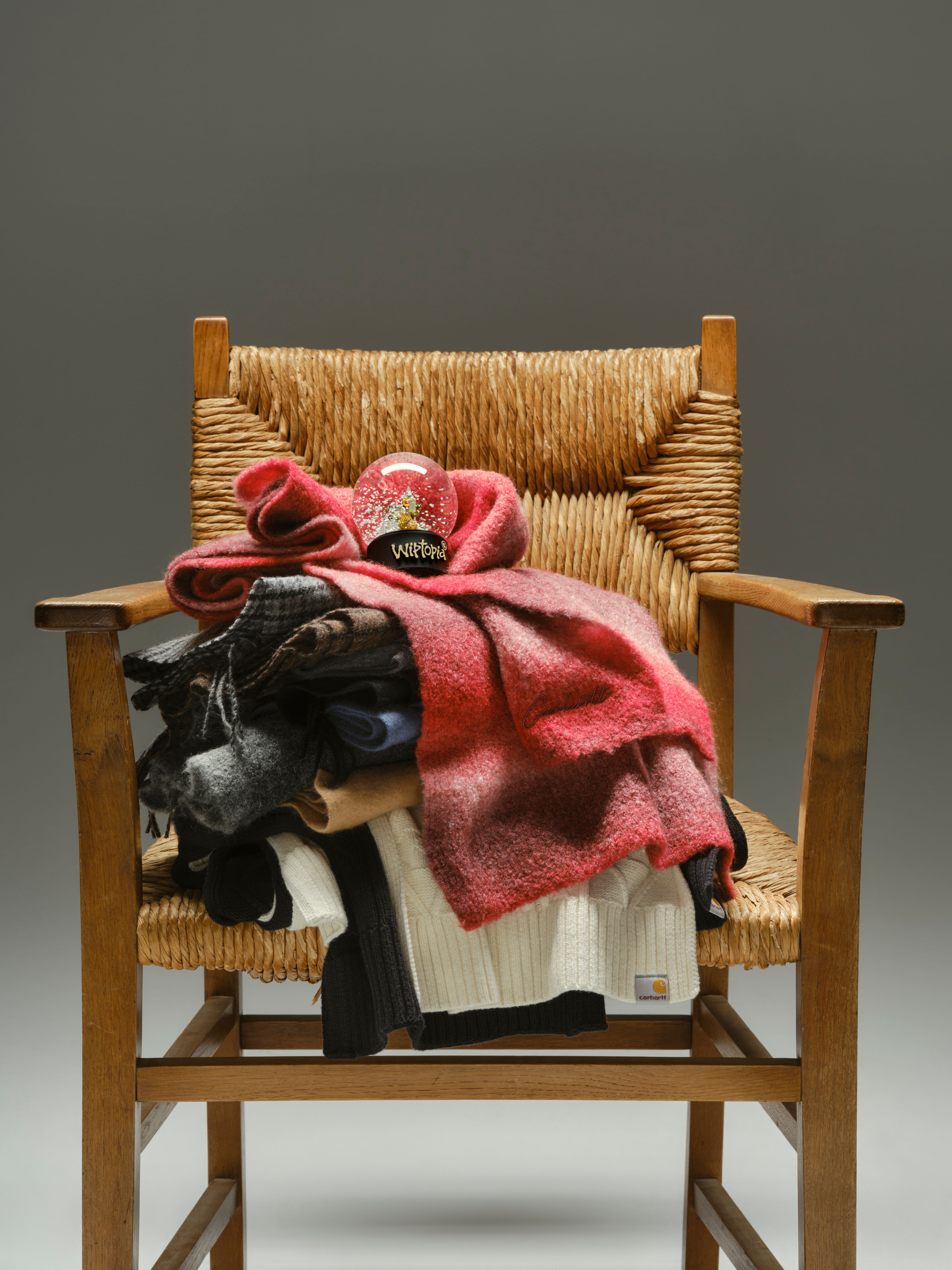 Carhartt WIP Scarves laying on a chair