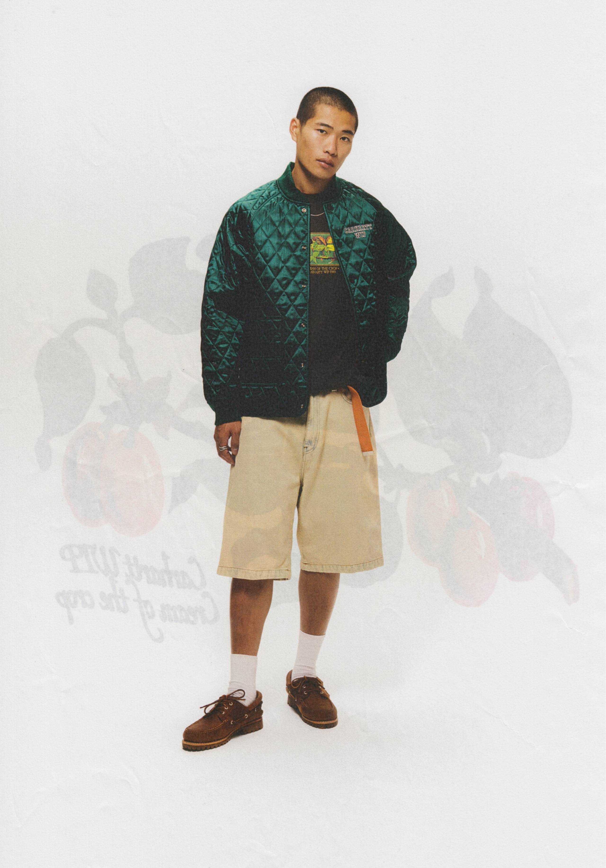 Model wearing Carhartt WIP Alumni Liner Jacket in Green