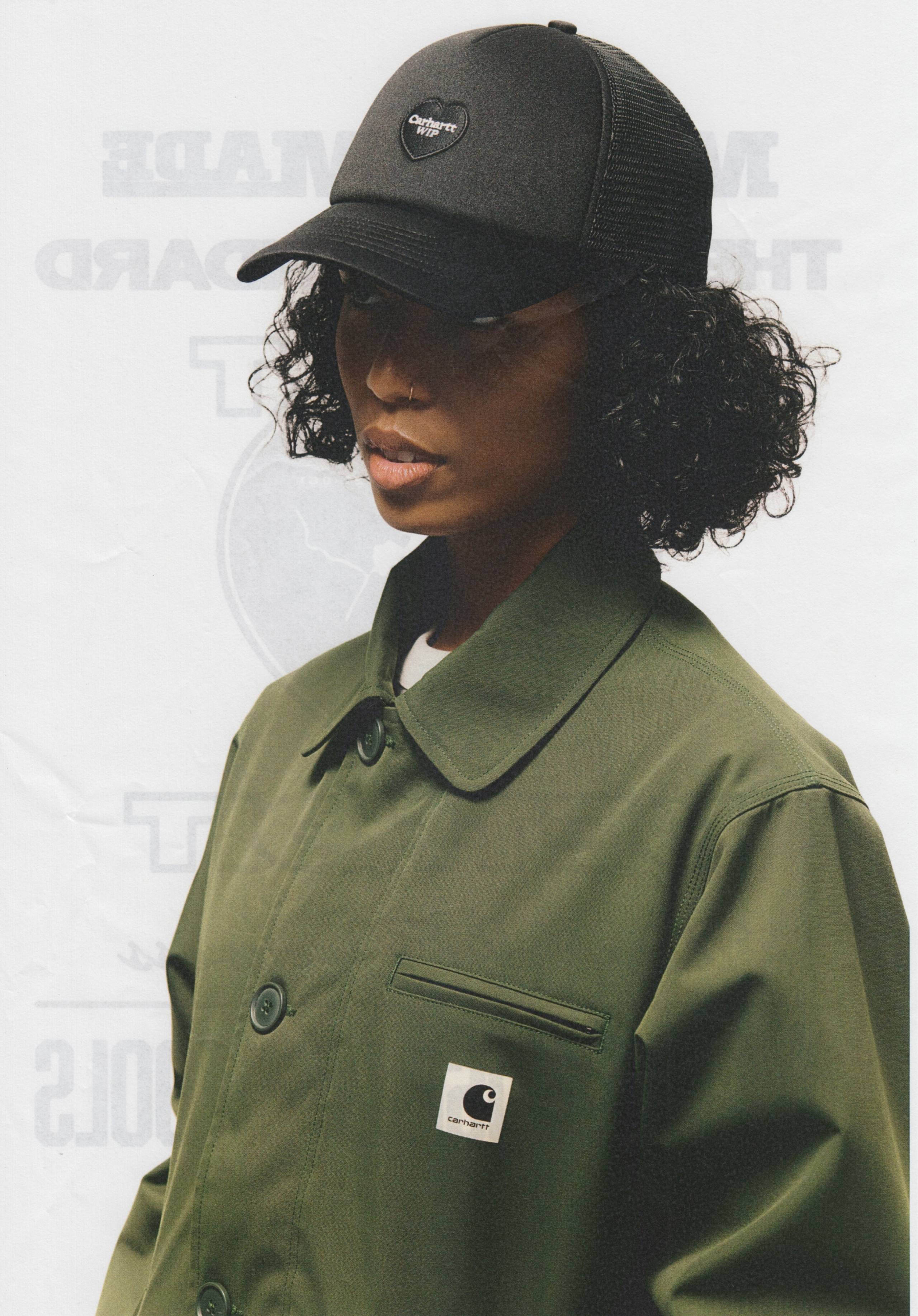 Model wearing Carhartt WIP Heart Patch Trucker Cap