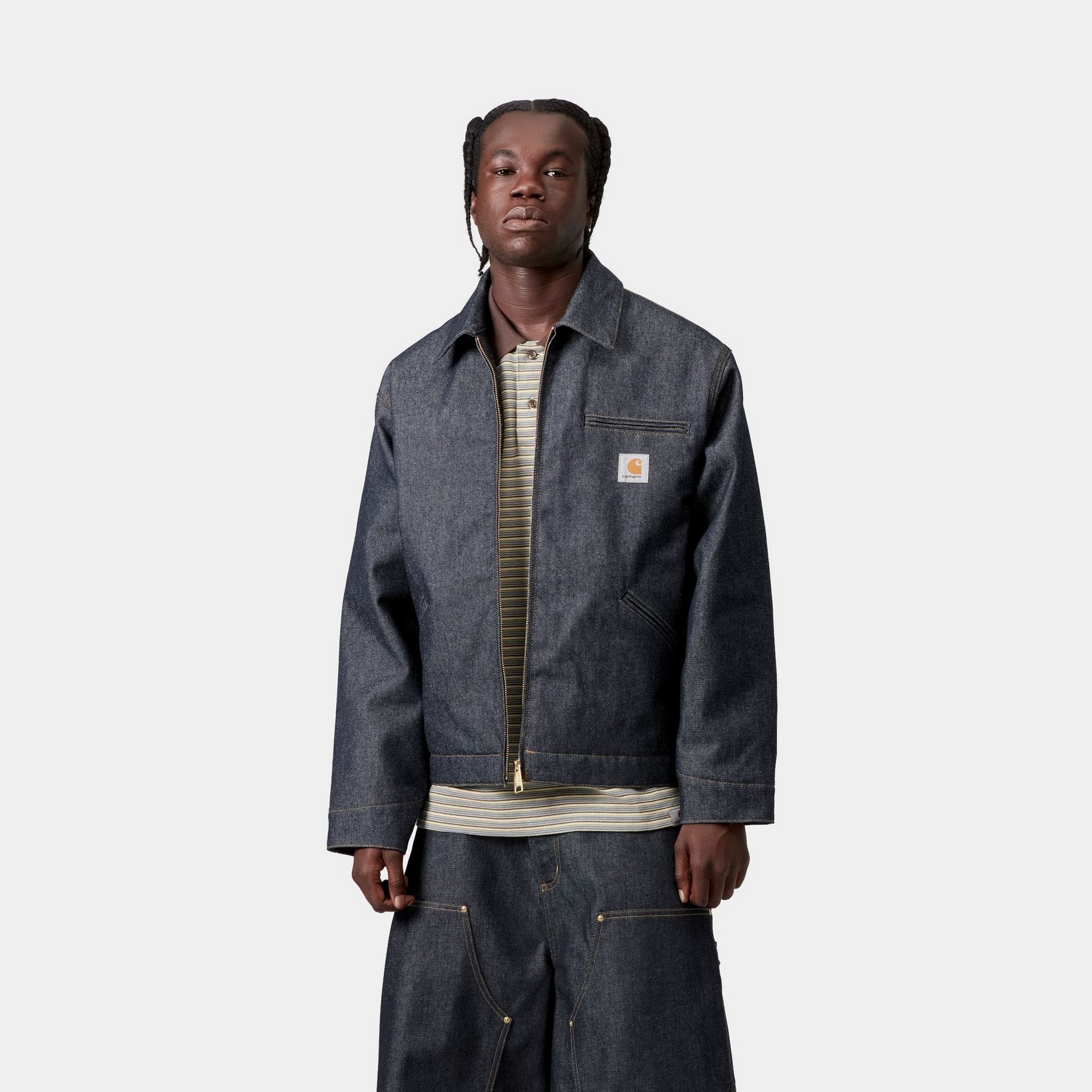 Model wearing a OG Detroit Jacket - Denim in Blue Rigid