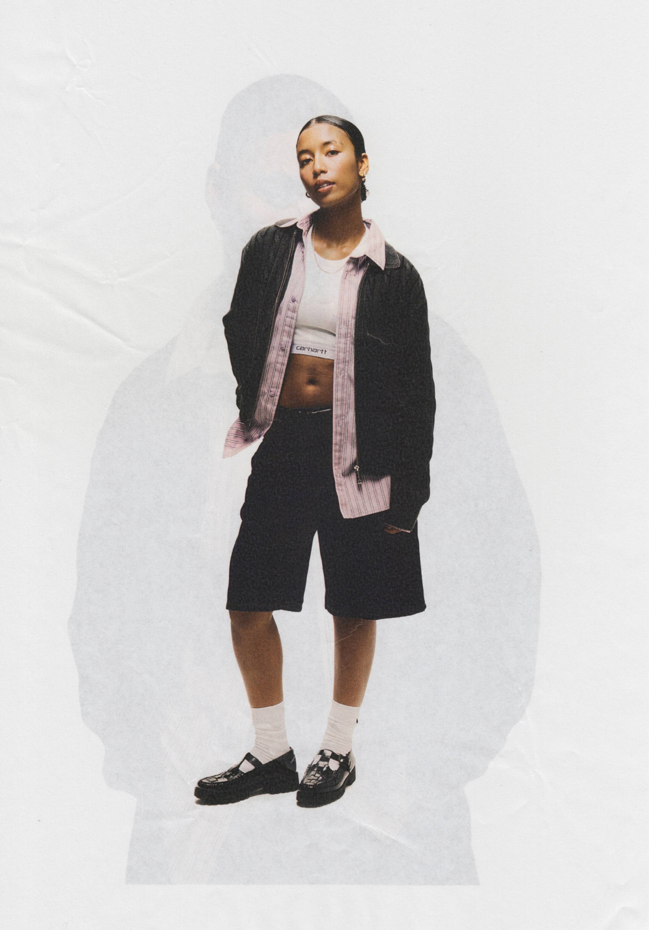 Model wearing Carhartt WIP Carter Sweater Jacket