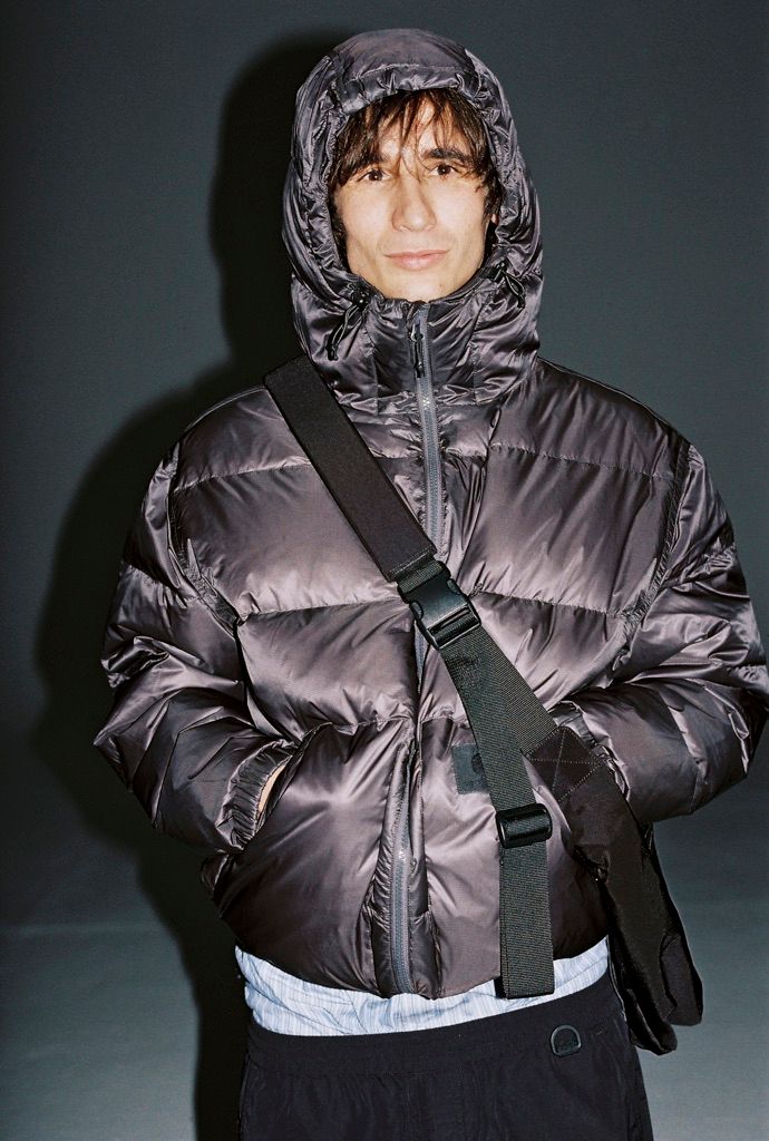 Model wearing a Lucid Jacket in Charcoal Grey in F/W25 Store Exclusives shoot