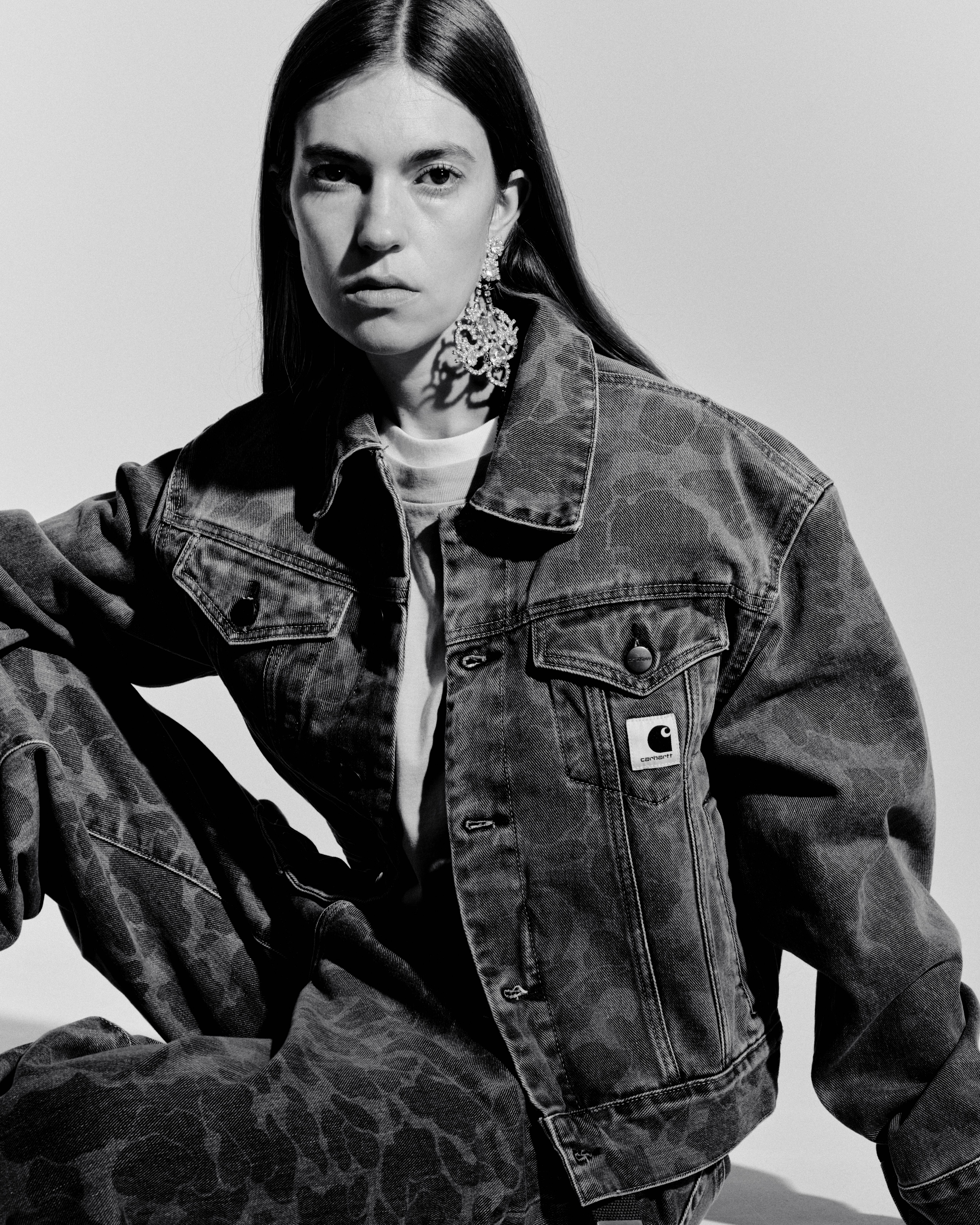 Black and White image of Model wearing a Women’s Duck Orell Jacket and Duck Orell Pant