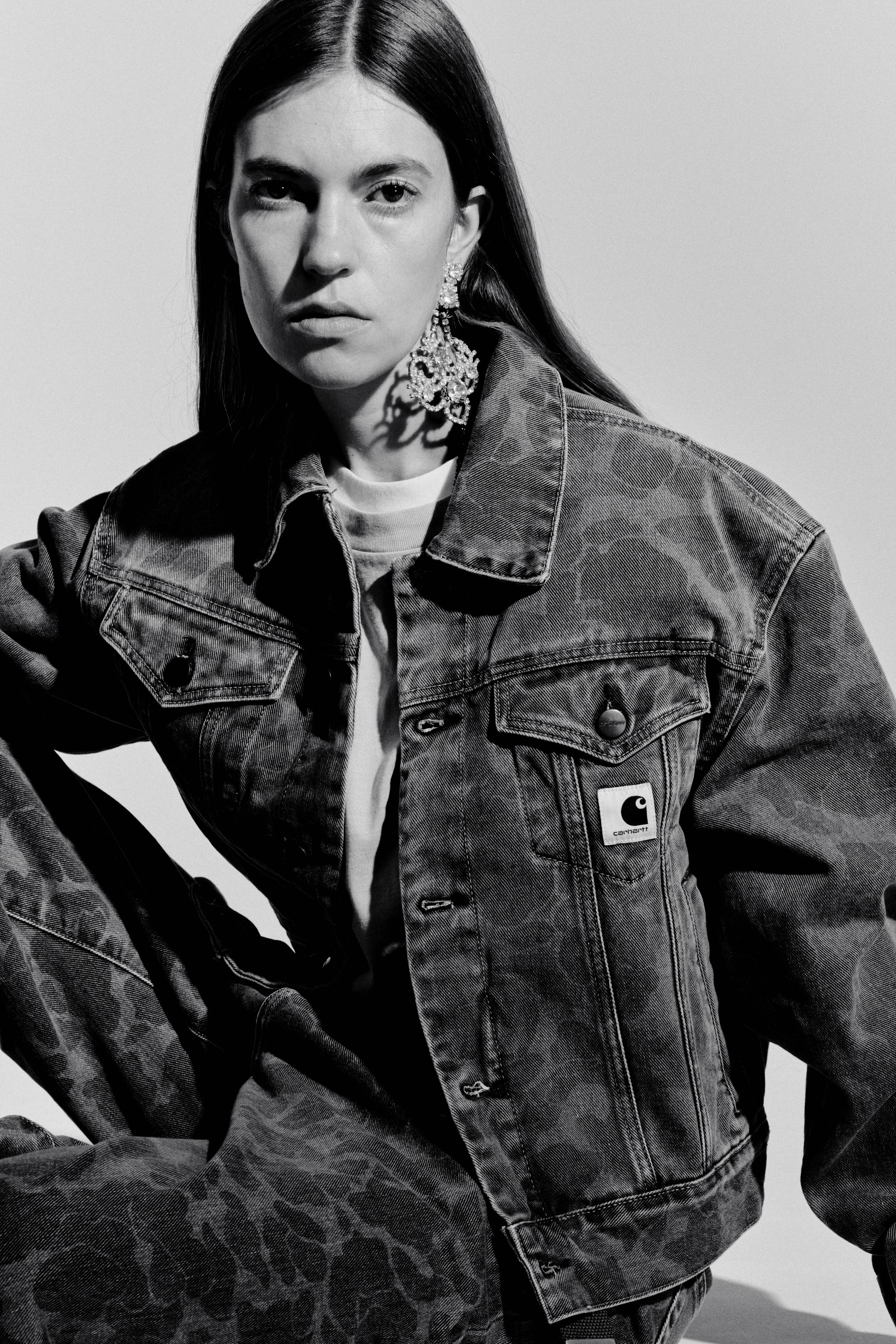 Black and White image of Model wearing a Women’s Duck Orell Jacket and Duck Orell Pant